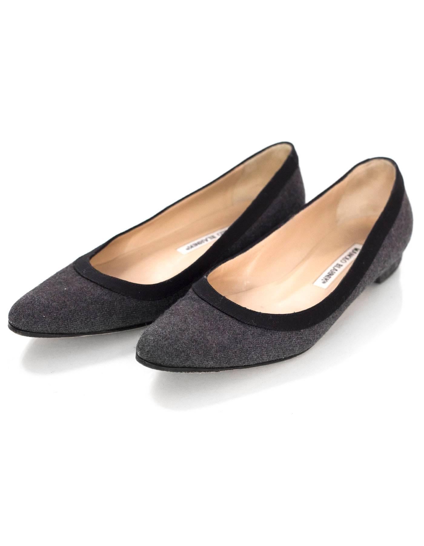 Manolo Blahnik Grey Wool Flats Sz 37

Made In: Italy
Color: Grey
Materials: Wool
Closure/Opening: Slide on
Sole Stamp: Manolo Blahnik 
Overall Condition: Excellent pre-owned condition with the exception of being re-soled
Included: Manolo Blahnik