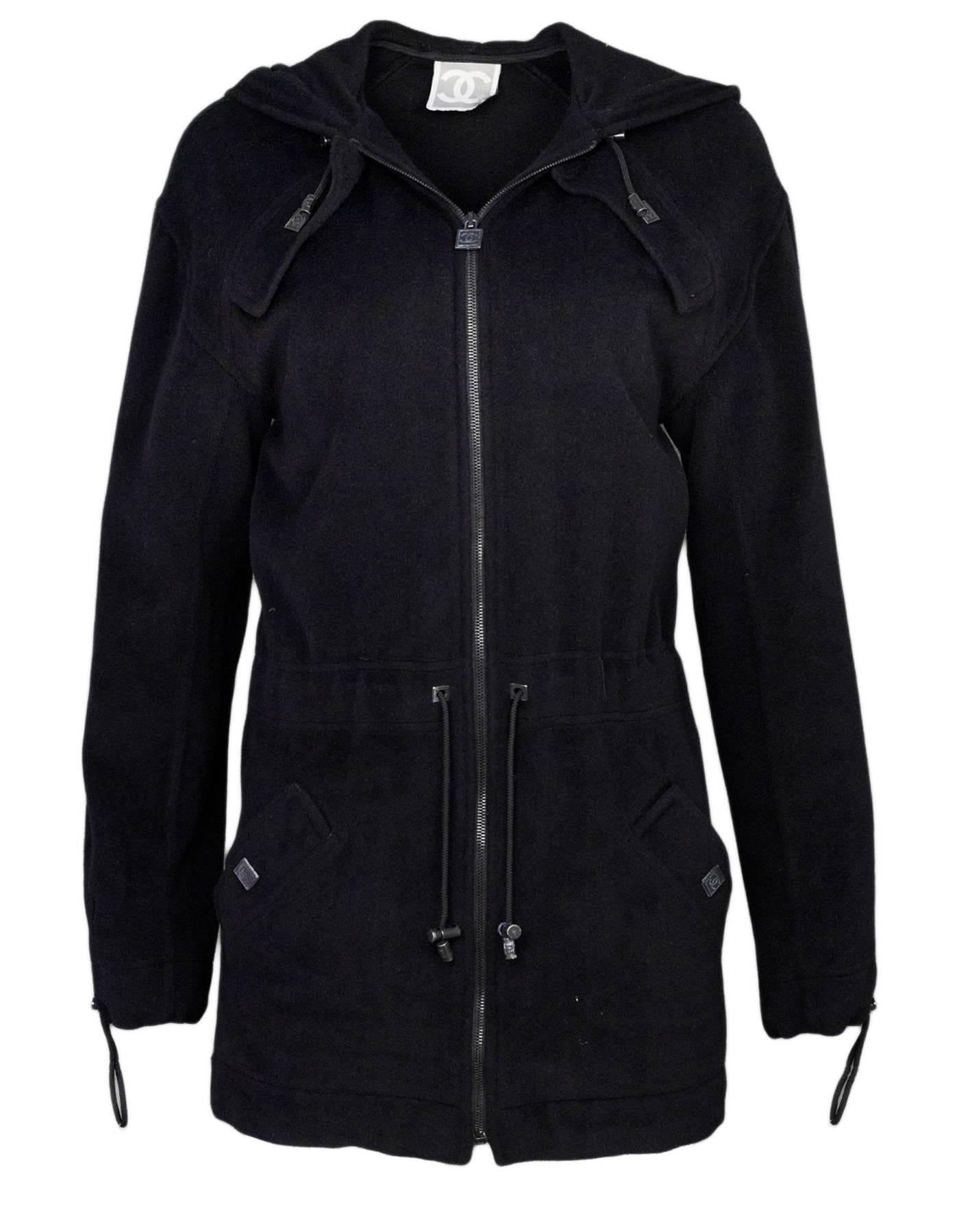 Chanel Sport Black Angora Hooded Jacket Sz FR38

Features drawstring waist 

Made In: France
Color: Black
Composition: 75% angora, 25% laine
Closure/Opening: Zip closure
Overall Condition: Excellent pre-owned condition
Marked Size: