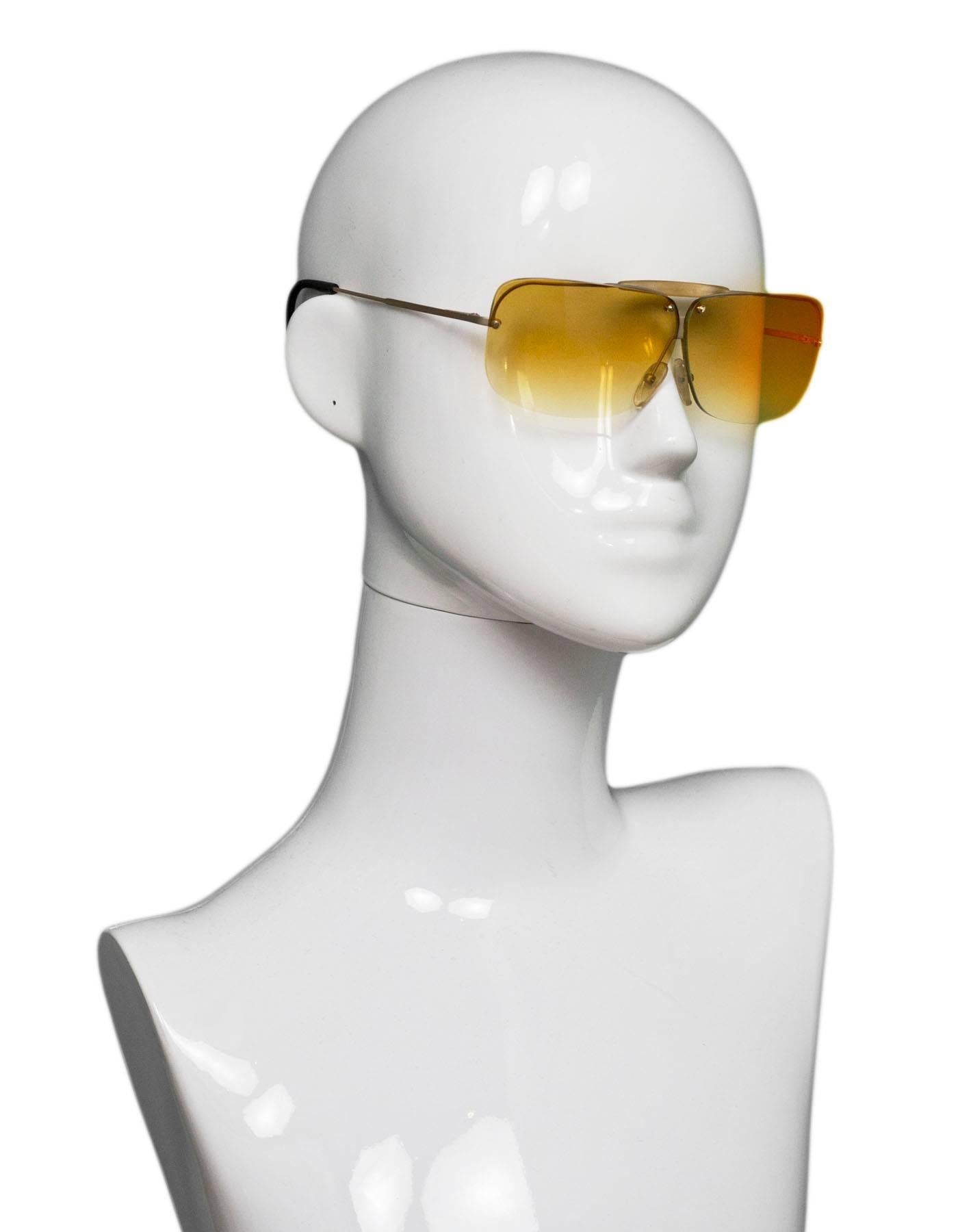 Bottega Veneta Vintage Ombre Sunglasses

Made In: Italy
Color: Yellow
Materials: Resin, metal
Overall Condition: Excellent vintage pre-owned condition, light surface marks
Included: Bottega Veneta case
Measurements: 
Across: 5.25"
Lens: