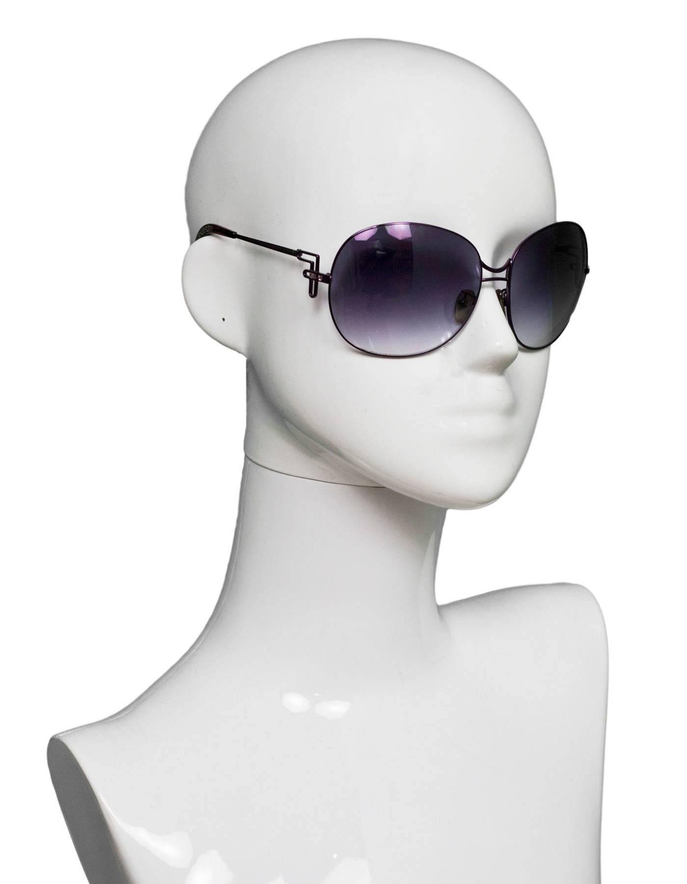 Fendi Purple Round Sunglasses

Made In: Italy
Color: Purple
Materials: Metal
Overall Condition: Excellent pre-owned condition, light surface marks
Included: Fendi case
Measurements: 
Across: 6"
Lens: 2.5"
Arm: 4.5"
