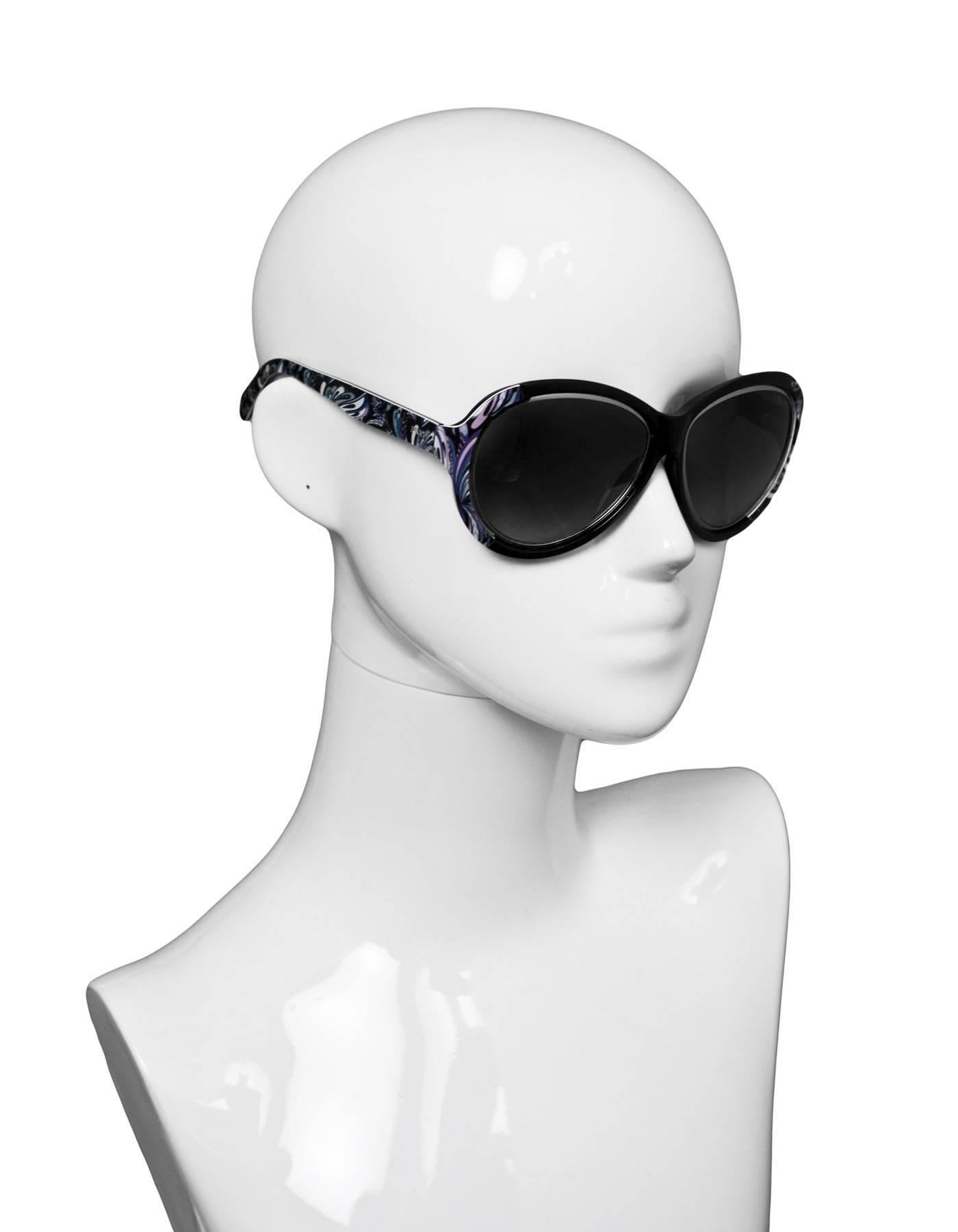 Emilio Pucci Black, Blue & Purple Sunglasses

Made In: Italy
Color: Black, blue & purple
Materials: Resin
Retail Price: $500 + tax
Overall Condition: Excellent pre-owned condition, light surface marks
Includes: Selina Optique