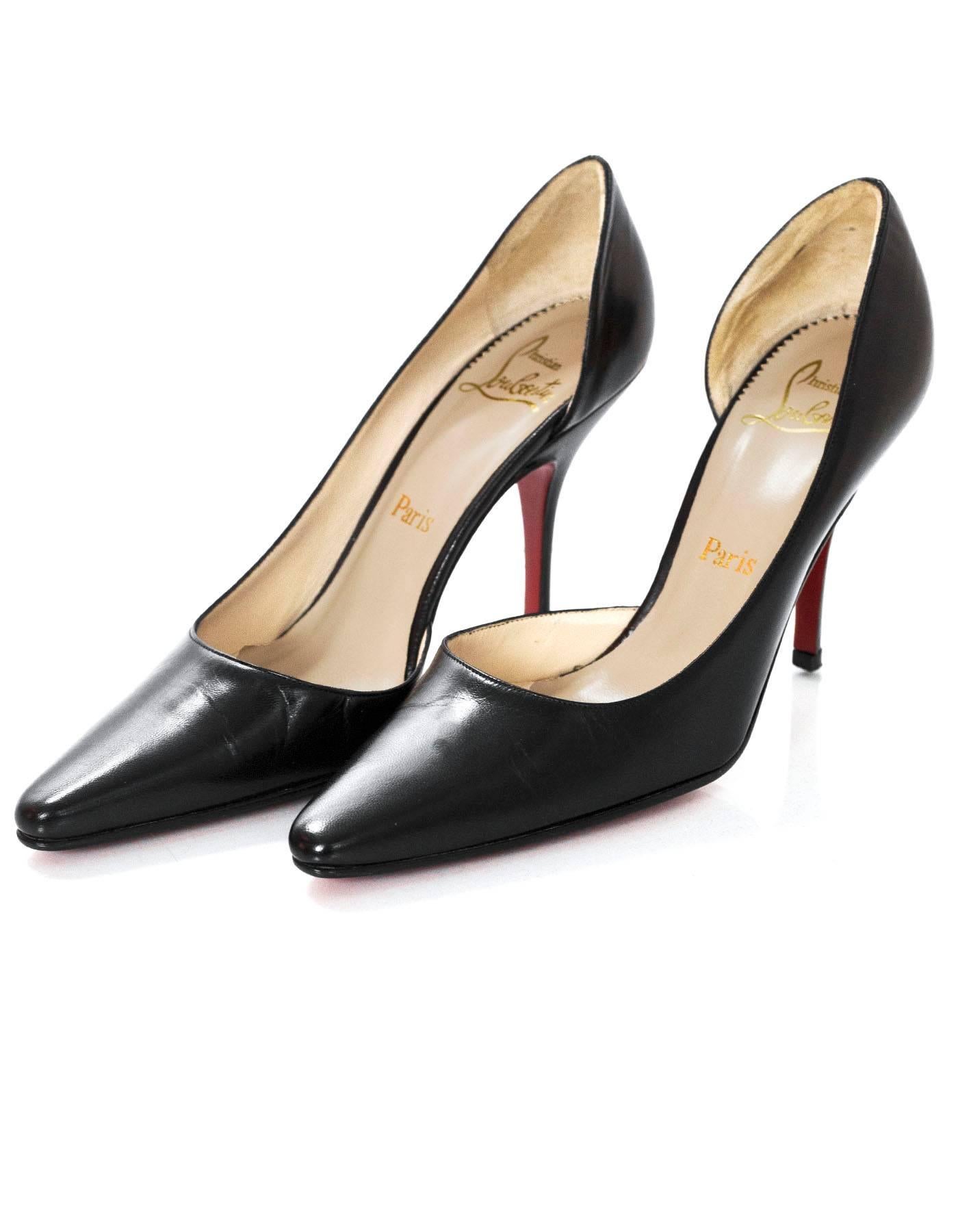 Christian Louboutin Black Leather d'Orsay Pumps Sz 37.5

Made In: Italy
Color: Black
Materials: Leather
Closure/Opening: Slide on
Sole Stamp: Christian Louboutin vero cuoio Made in Italy 37.5
Overall Condition: Excellent pre-owned condition with the