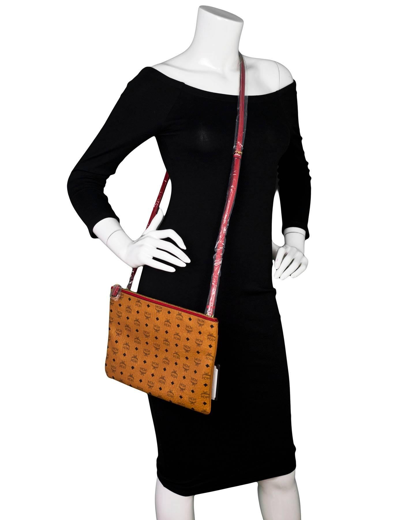 MCM Cognac Monogram Medium Flat Crossbody/Clutch Bag NWT For Sale at