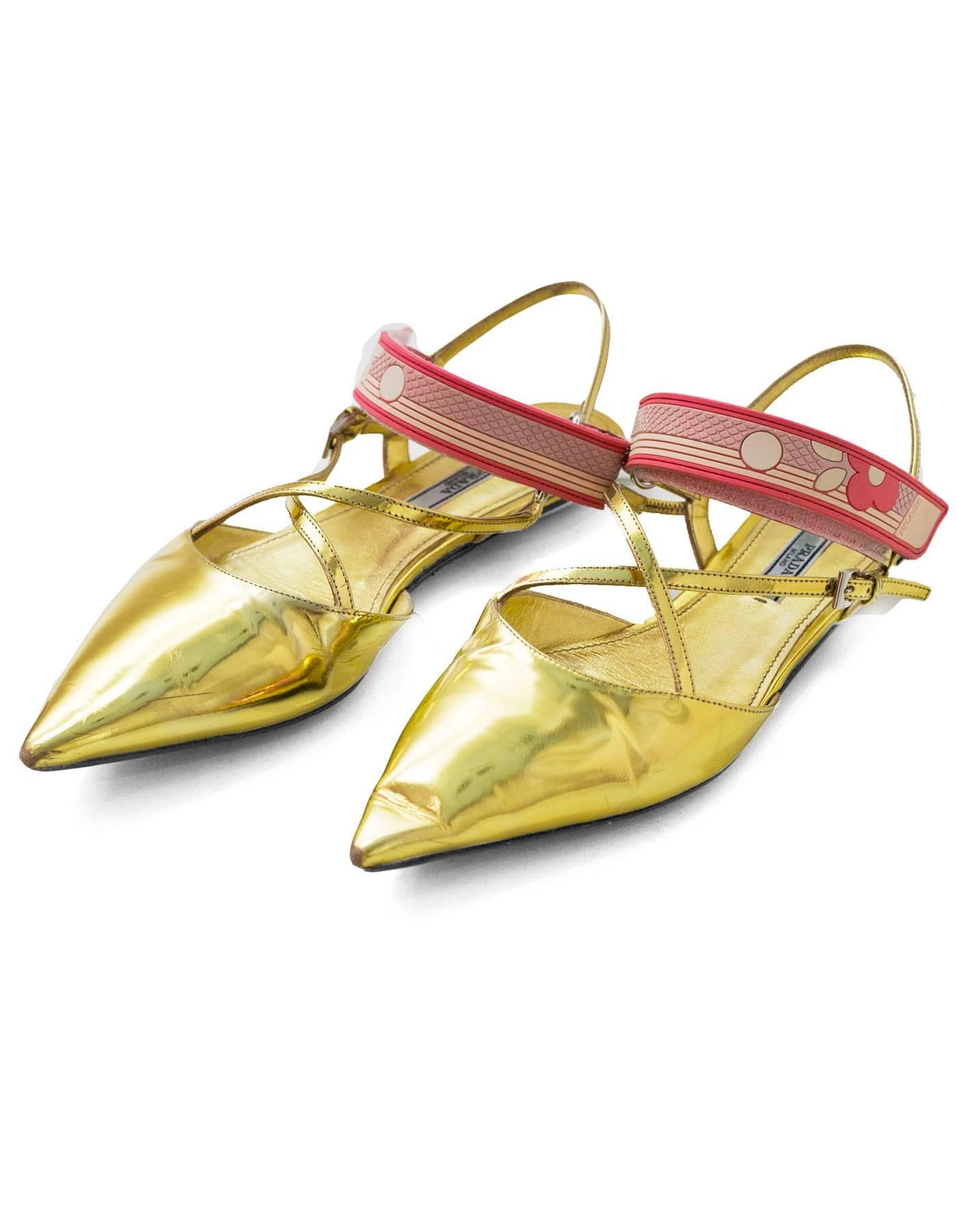 Prada Gold Glazed Leather Flats Sz 38.5

Features pink strap across vamp

Made In: Italy
Color: Gold, pink
Materials: Glazed leather
Closure/Opening: Velcro strap across vamp
Sole Stamp: Prada 38.5 Made in Italy
Overall Condition: Excellent
