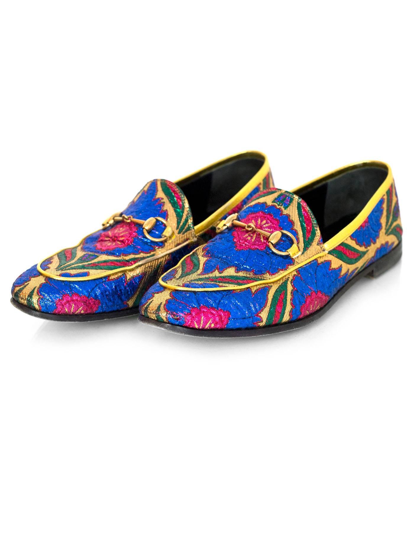 Gucci Brocade Multi-Colored Loafers Sz 38

Made In: Italy
Color: Multi
Materials: Nylon-blend
Closure/Opening: Slip on
Sole Stamp: Gucci Made in Italy 38
Retail Price: $670 + tax
Overall Condition: Excellent pre-owned condition with the exception of