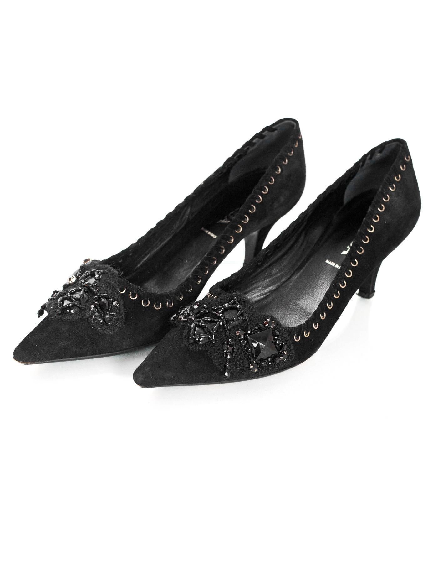 Prada Black Suede & Beaded Pumps Sz 37.5

Made In: Italy
Color: Black
Materials: Suede, beads
Closure/Opening: Slide on
Sole Stamp: Prada 37.5 Made in Italy
Overall Condition: Excellent pre-owned condition with the exception of some wear at insoles