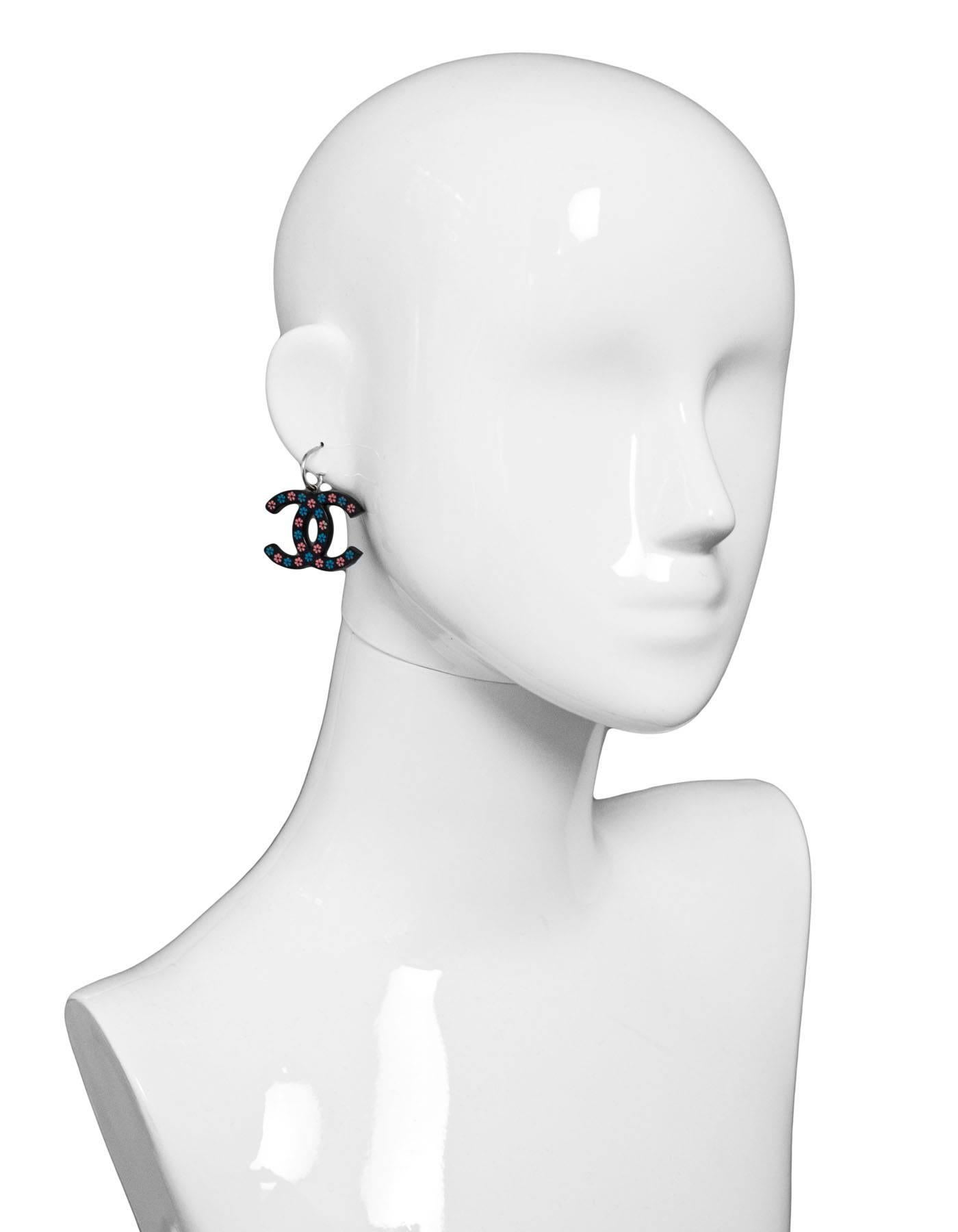 Chanel Black, Blue & Pink Floral CC Earrings

Made In: France
Color: Black, blue, pink
Hardware: Silvertone
Stamp: Chanel 15 CC P Made in France
Materials: Resin, metal
Closure: Pierced back
Overall Condition: Excellent pre-owned