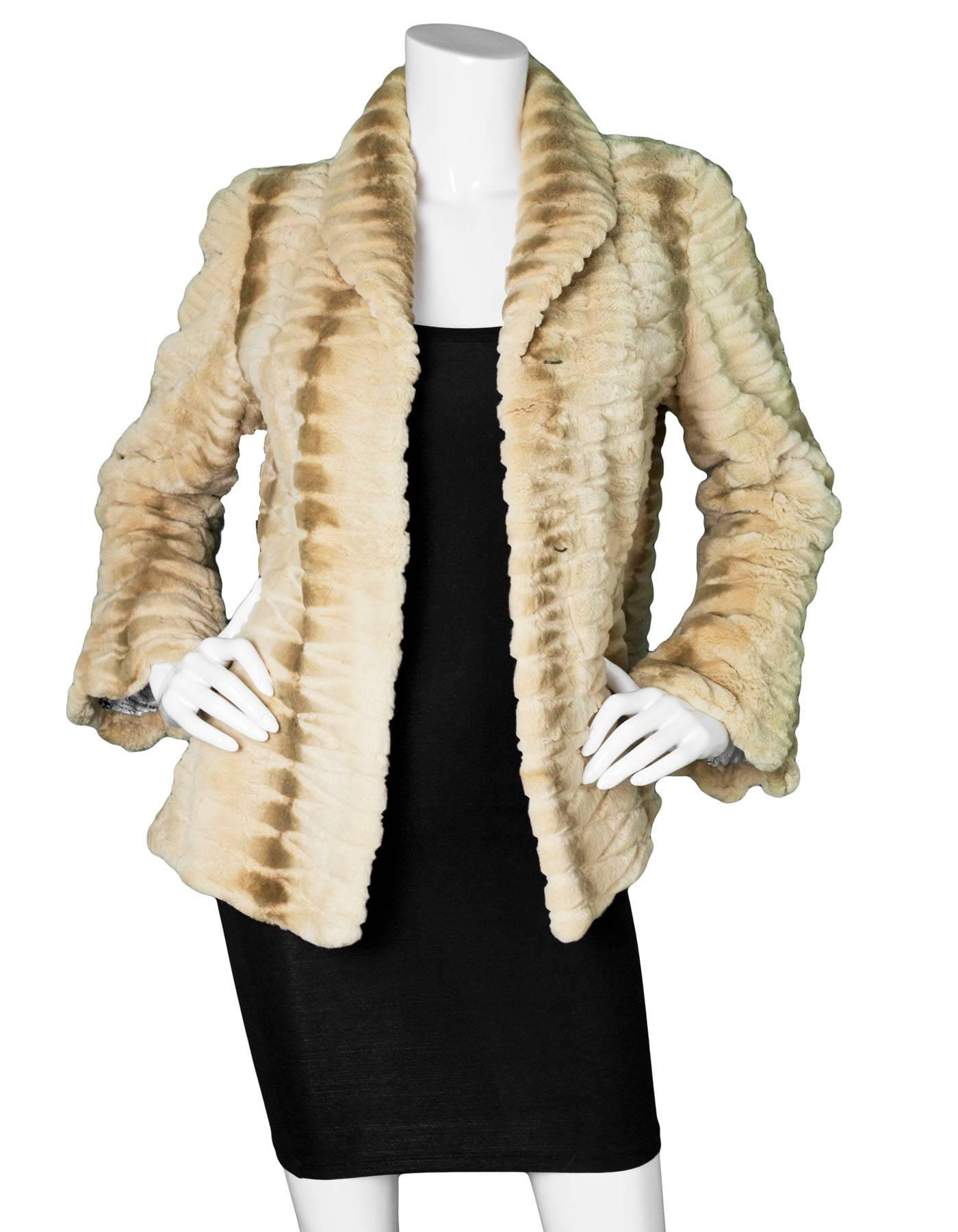 Sageo Beige Rabbit Fur Jacket Sz S

Color: Beige
Composition: 100% fur
Lining: Print textle
Closure/Opening: Front hook and eye closures
Exterior Pockets: Two hip pockets
Interior Pockets: None
Overall Condition: Excellent pre-owned condition
Marked