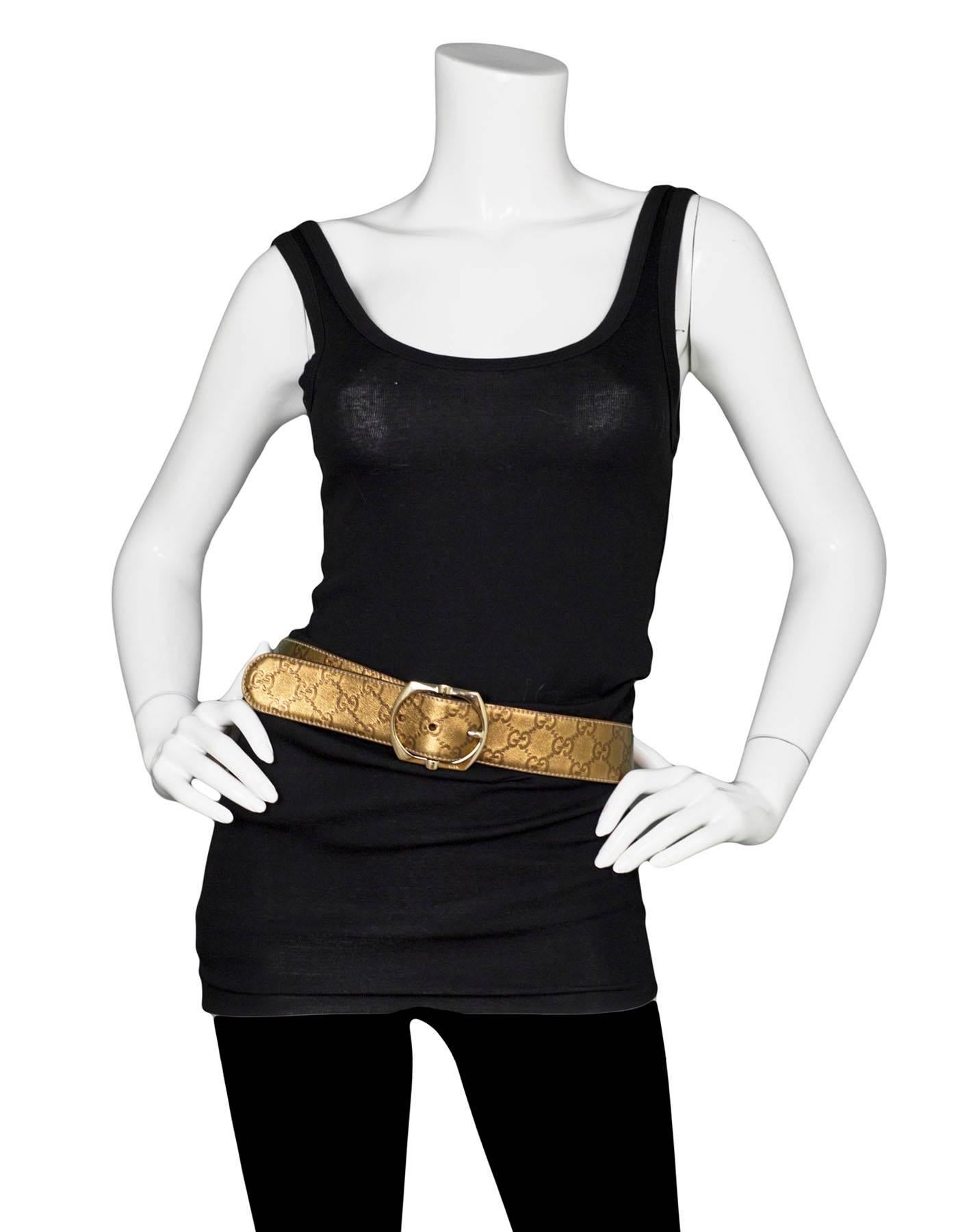 Gucci Bronze Metallic Guccissima Leather Belt Sz 85

Made In: Italy
Color: Bronze metallic
Hardware: Goldtone
Materials: Leather, metal
Closure/Opening: Buckle closure
Stamp: Gucci Made in Italy 181462 1476 85 34
Overall Condition: Excellent