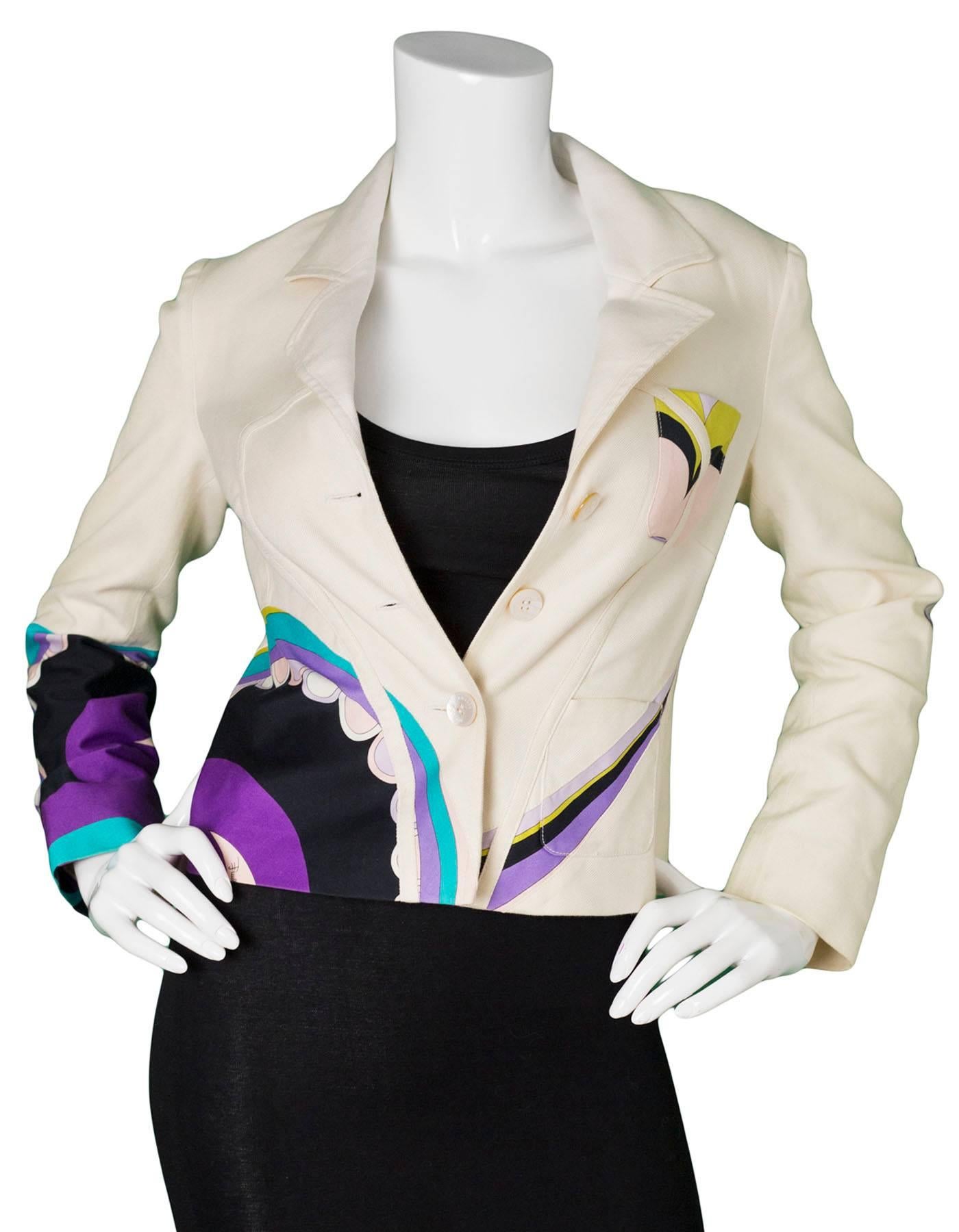 Emilio Pucci Beige & Multi-Colored Printed Jacket
Features multi-colored design throughout 

Made In: Italy
Color: Beige, green, purple, black, pink, turquoise
Composition: 70% cotton, 30% silk
Lining: Beige, 100% polyester
Closure/Opening: