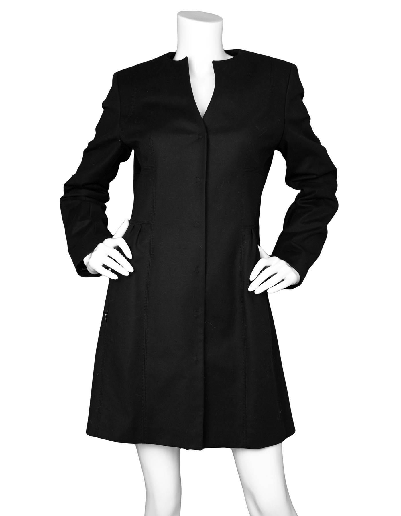 Elie Tahari Black Evening Jacket

Made In: China
Color: Black
Composition: 97% cotton, 3% elastane
Lining: Brown, 95% polyester, 5% elastane
Closure/Opening: Snap button down closure 
Exterior Pockets: Two hip zipper pockets
Interior Pockets: