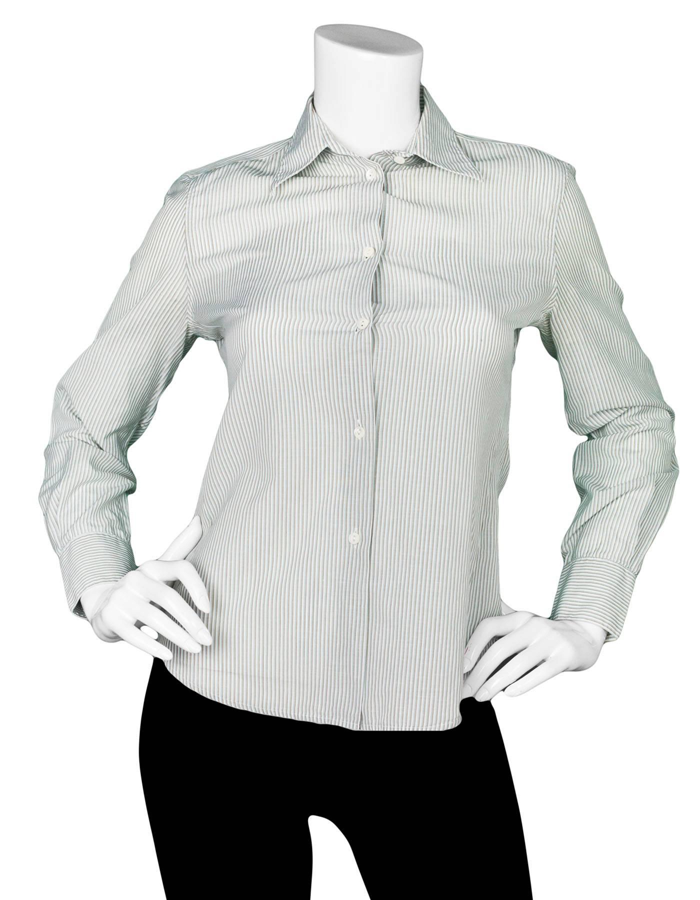 Loro Piana Pastel Stripe Button Down Top 

Made In: Italy
Color: White, pale blue, and taupe
Composition: 170% cotton, 30% flax
Lining: None
Closure/Opening: Button down front
Exterior Pockets: None
Interior Pockets: None
Overall Condition: