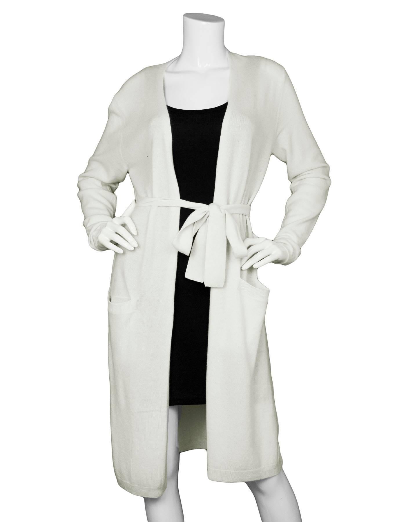 Theory Cream Cashmere Long Open Cardigan 
Features optional waist tie and one slit on each side of exterior

Made In: China
Color: Cream
Composition: 100% cashmere
Lining: None
Closure/Opening: Open front with optional waist tie closure
Exterior