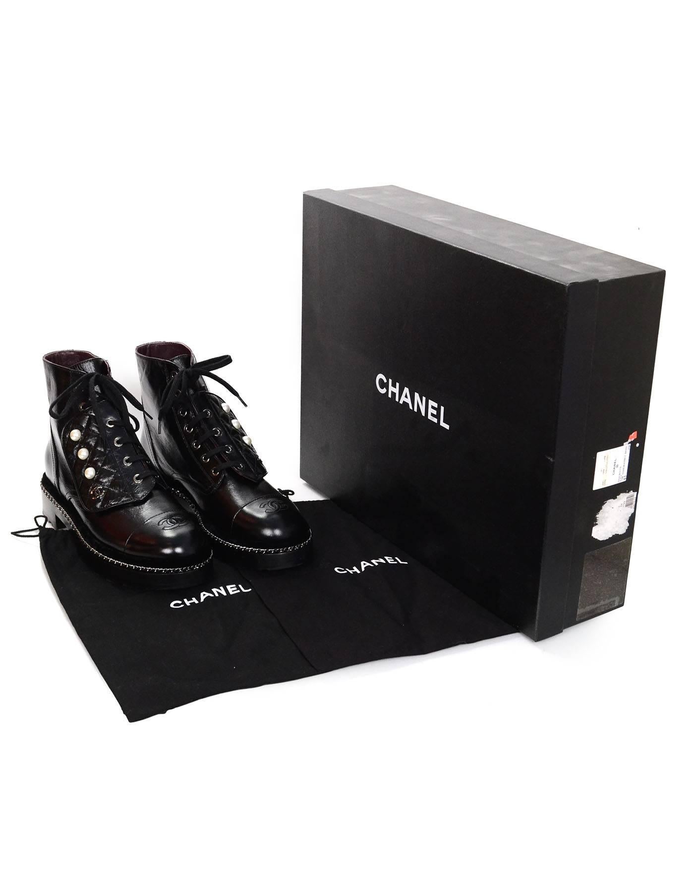 Chanel 2017 Black Calfskin Leather Pearl and Chainlink Combat Boots Sz 39  NIB For Sale at 1stDibs | chanel boots with pearls, chanel pearl combat  boots, chanel combat boots with pearls