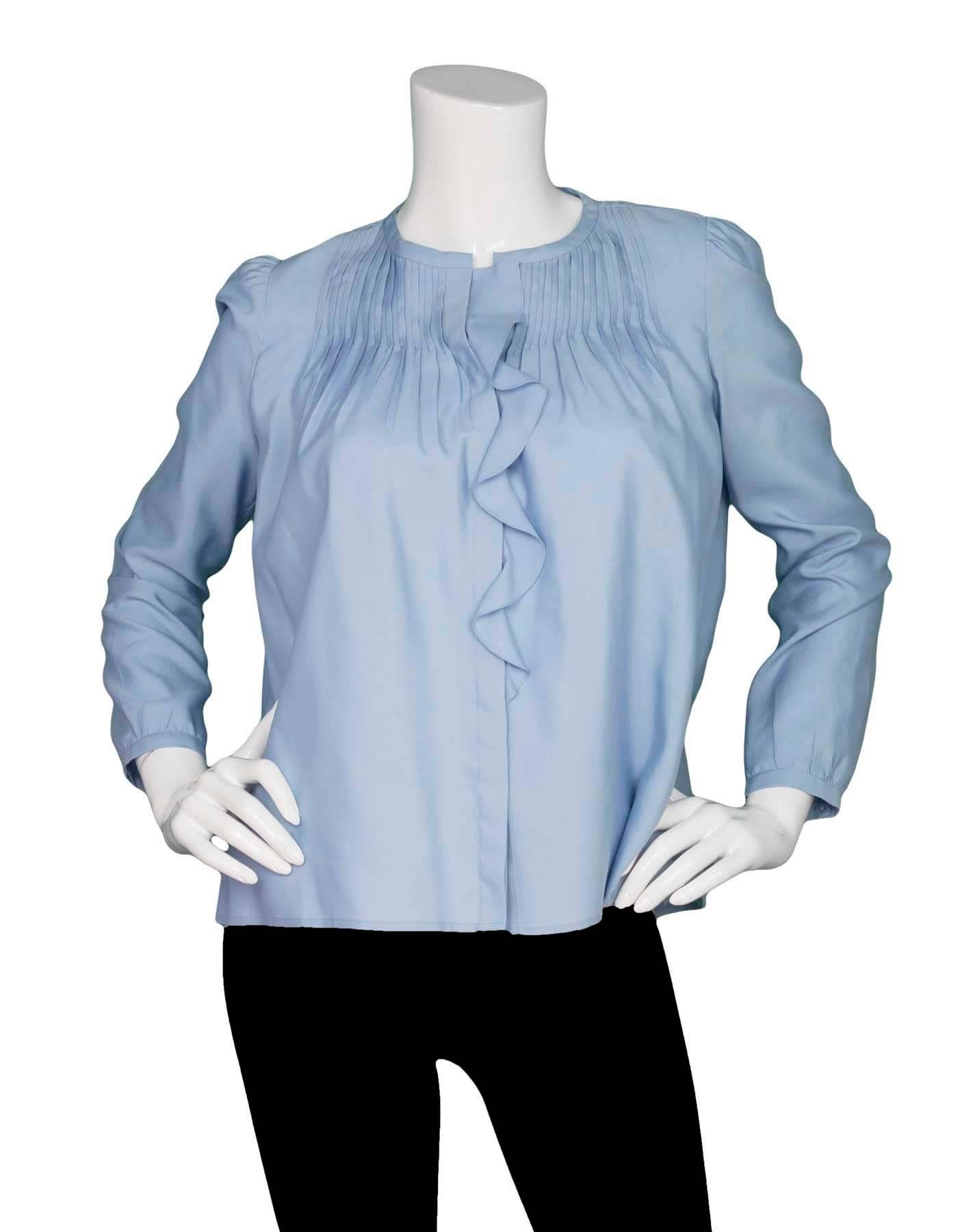 Isabel Marant Baby Blue Silk Pleated Blouse 
Features ruffles down front button opening and drawstring on interior back panel for optional fitted look

Made In: Romania
Color: Baby blue
Composition: 100% silk
Lining: None
Closure/Opening: Button