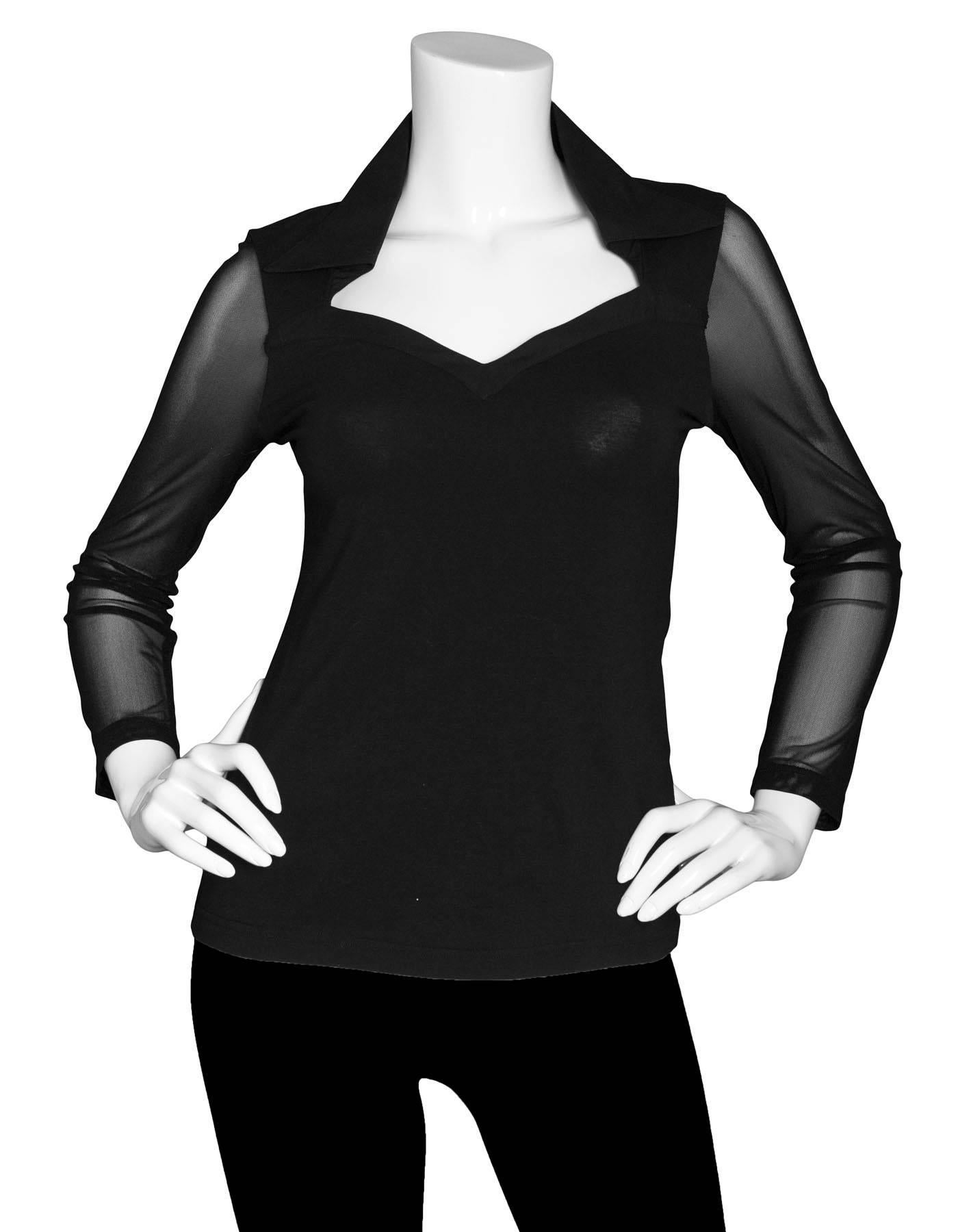 Anne Fontaine Black Sheer Longsleeve Top Sz FR38

Fetures sweetheart neckline and mesh sleeves

Made In: France
Color: Black
Composition: 93% Pima cotton, 7% Elastane
Lining: None
Closure/Opening: Pull over 
Overall Condition: Excellent pre-owned