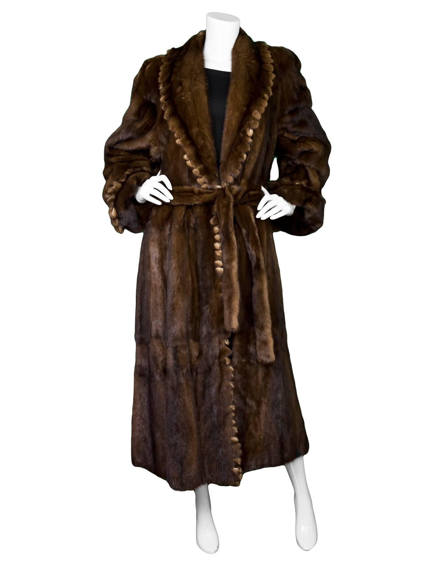 Adolfo Brown Long Mink Coat Sz 8

Color: Brown
Composition: Mink fur
Lining: Brown textile
Closure/Opening: tie at waist
Exterior Pockets: Two hip pockets
Interior Pockets: None
Overall Condition: Excellent pre-owned condition, some wear at