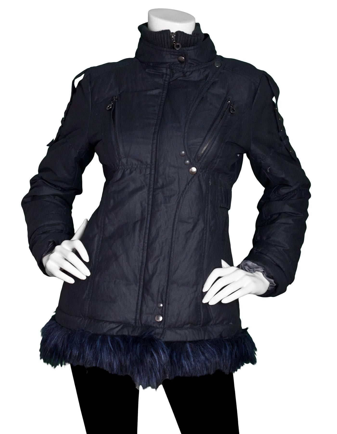 Navy Metallic Zip Jacket with Fur Trim

Features removable faux fur trim

Color: Navy metallic
Composition: unknown, feels like nylon blend
Lining: Grey textile
Closure/Opening: Front zip closure
Exterior Pockets: Hip pockets and chest zip