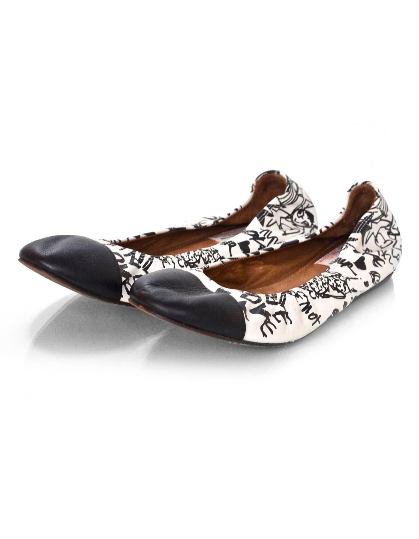 Lanvin Black & White Leather Graffiti Flats

Made In: Portugal
Color: Black, white
Materials: Leather
Closure/Opening: Slide on
Sole Stamp: Lanvin Paris
Overall Condition: Excellent pre-owned condition, light wear at outsoles
Marked Size: Not