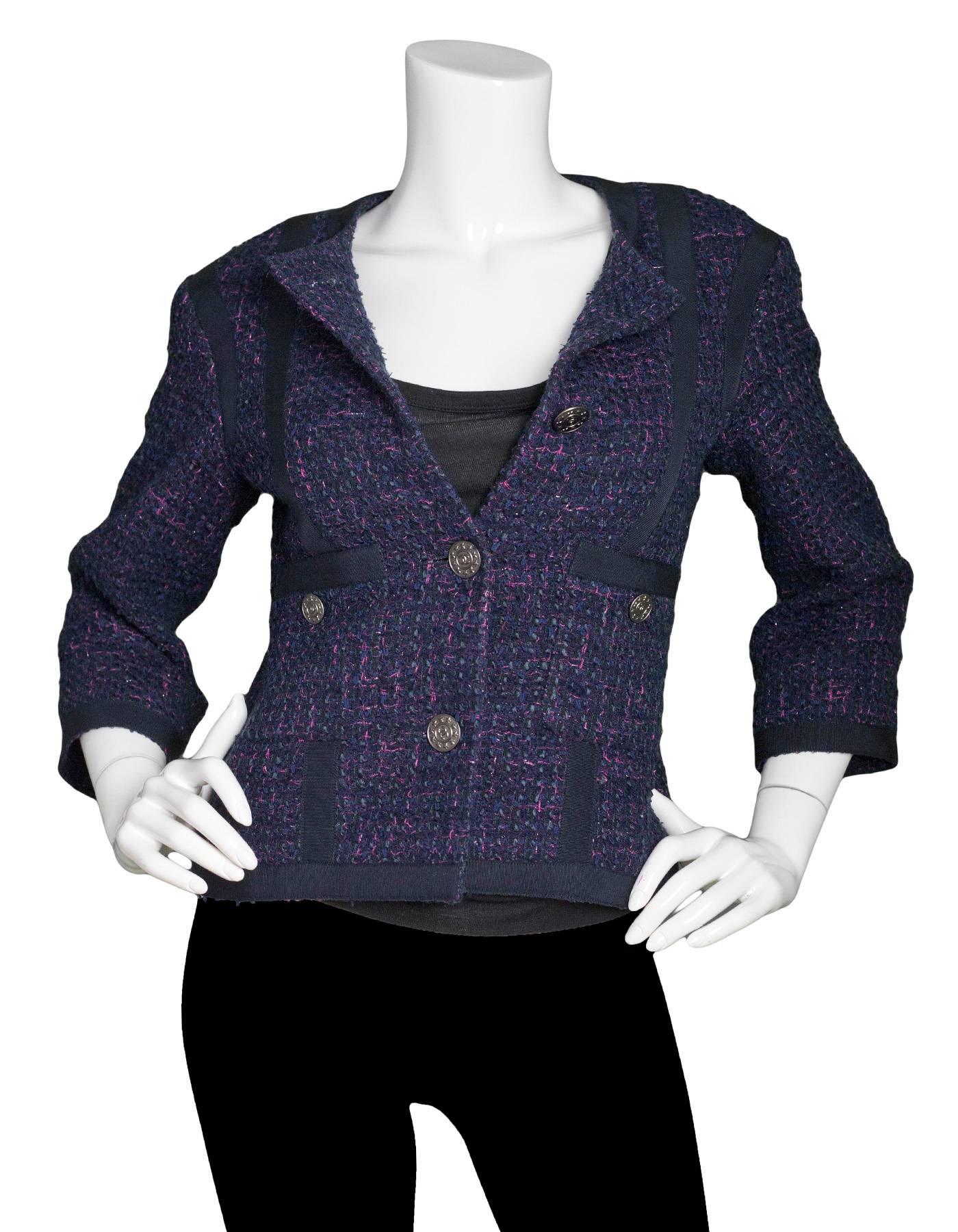 Chanel Navy & Pink Tweed Jacket with Grossgrain Trim Sz FR36

Features star CC buttons

Made In: France
Color: Black, pink, navy
Composition: 41% Nylon, 41% Cotton, 10% Acrylic, 3% Wool, 3% Rayon, 2% Polyester
Lining: NAvy 100% Silk
Closure/Opening: