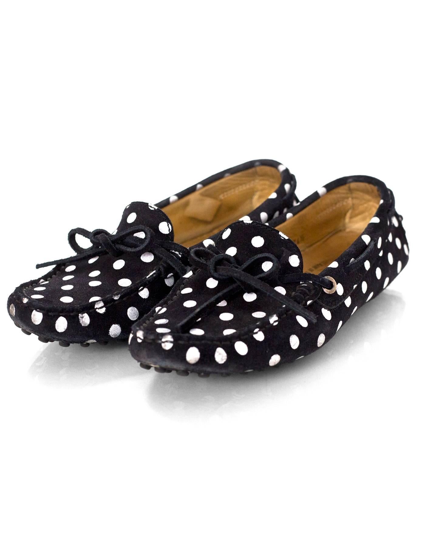 TOD's Black & White Polka Dot Driving Loafers Sz 34.5

Color: Black, white
Materials: Suede
Closure/Opening: Slide on
Sole Stamp: TODS
Overall Condition: Very good pre-owned condition with the exception of moderate wear and soiling throughout