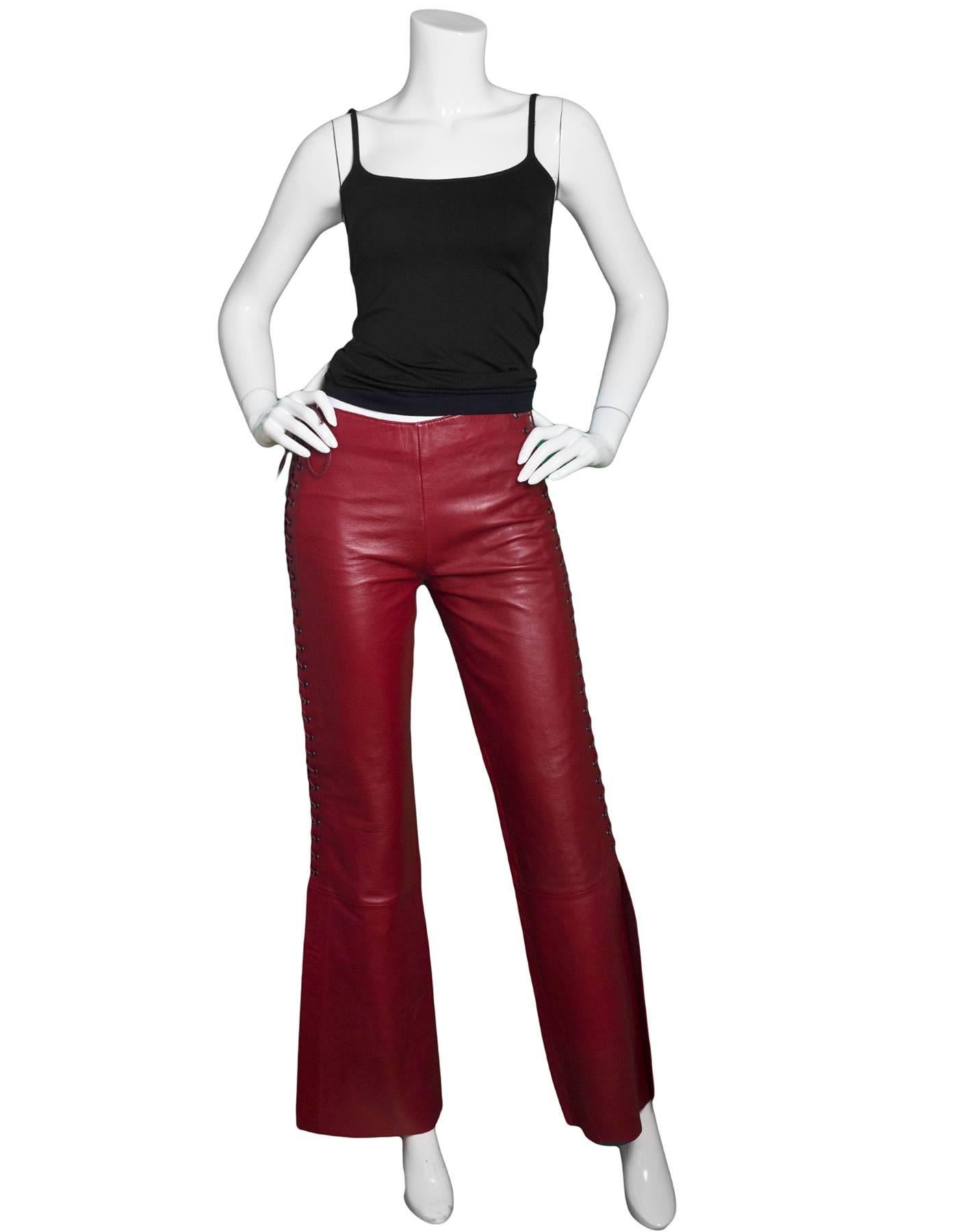 Catherine Malandrino Red Leather Lace Up Pants Sz 2

Made In: China
Color: Red
Closure/Opening: Side lace to closures
Exterior Pockets: Nnoe
Interior Pockets: None
Overall Condition: Excellent pre-owned condition with the exception of being gently