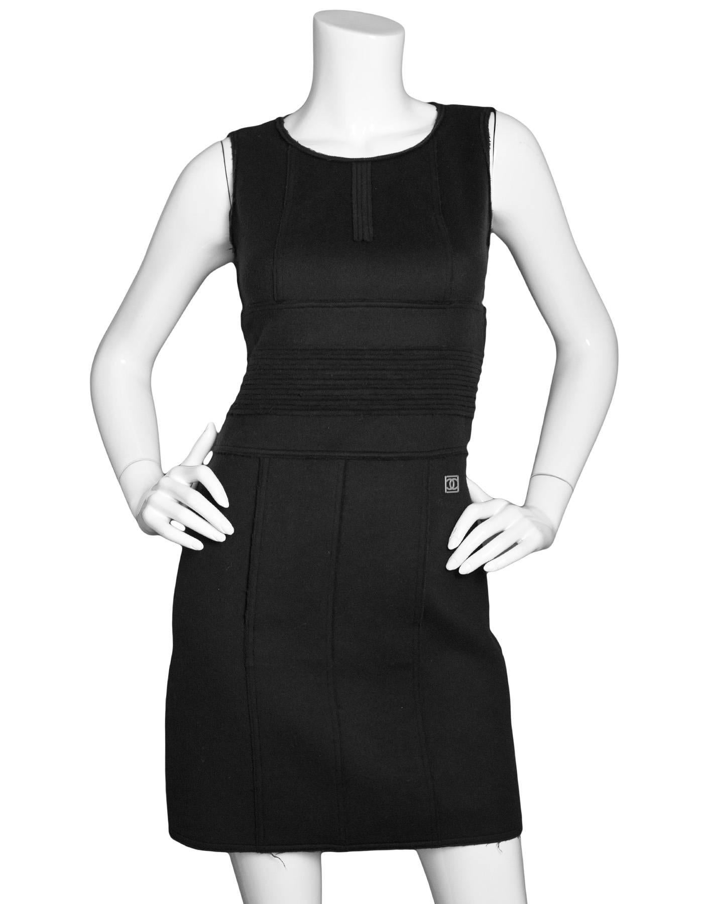 Chanel Sport Black Wool Sleeveless Dress Sz FR34

Made In: France
Color: Black
Composition: 100% Wool
Lining: none
Closure/Opening: Back zip closure
Exterior Pockets: None
Interior Pockets: None
Overall Condition: Excellent pre-owned condition,