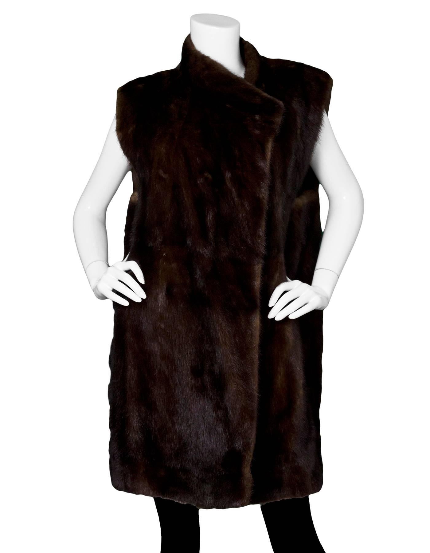 Vintage Brown Fur Open Front Vest/Lining 
**Please note: this vintage piece was originall apart of another coat or jacket as an insert and still contains buttons on interior for attachment**

Color: Brown
Composition: Fur
Lining: Believed to be a