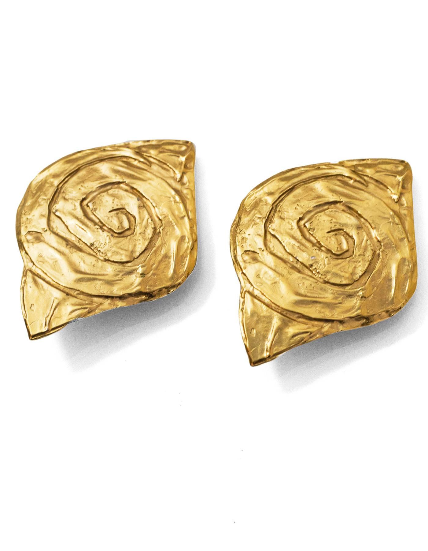 Yves Saint Laurent Vintage Goldtone Rive Gauche Spiral Clip-On Earrings

Made In: France
Color: Gold
Materials: Metal
Closure: Clip-on
Overall Condition: Excellent vintage pre-owned condition

Measurements: 
Length: 2.75