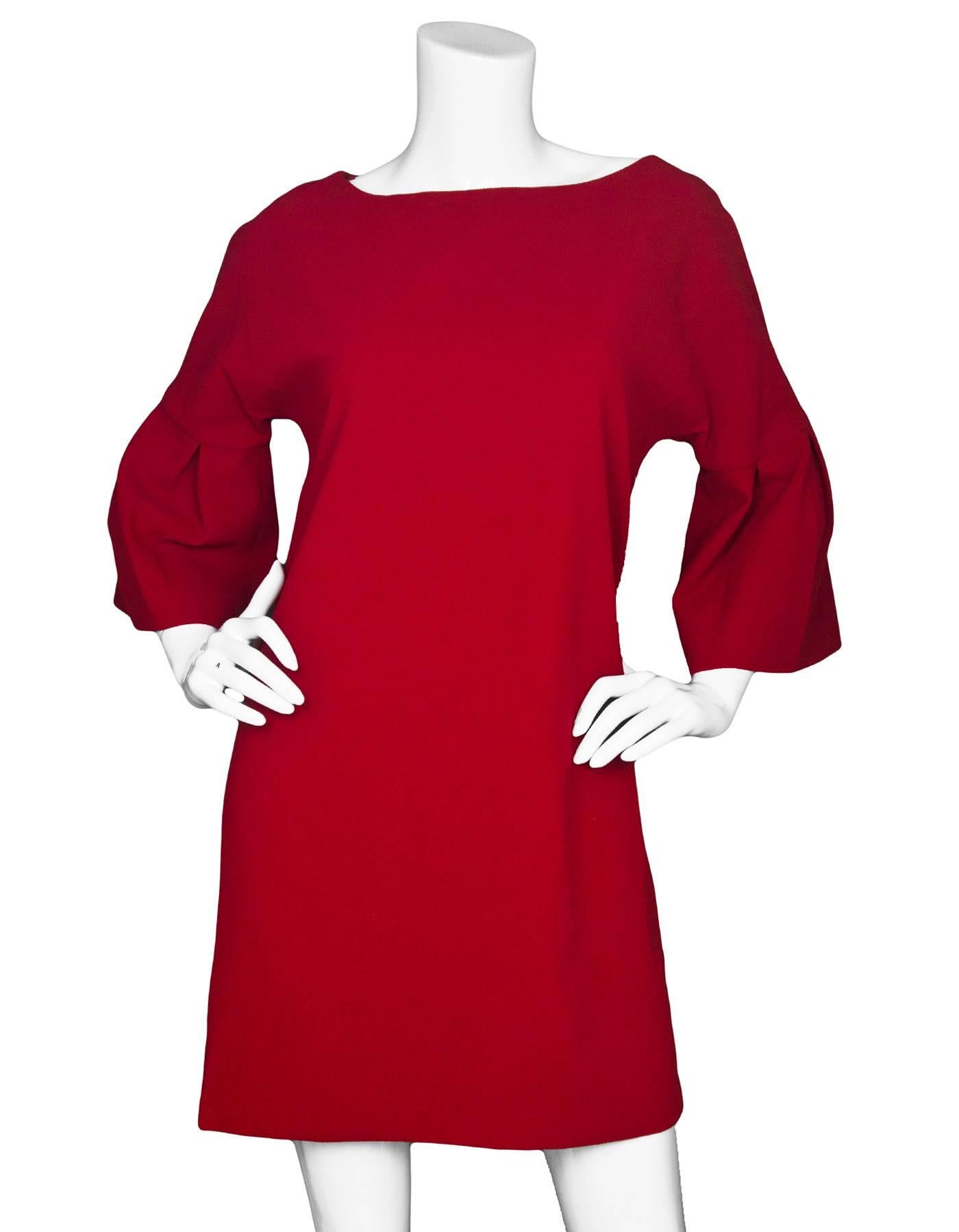 Badgley Mischka Red Sheath Dress Sz 4 NWT

Features bell sleeves and scopp neckline

Made In: China
Color: Red
Composition: 100% Polyester
Lining: Red textile
Closure/Opening: Zip closure at back
Retail Price: $330 + tax
Overall Condition: Excellent