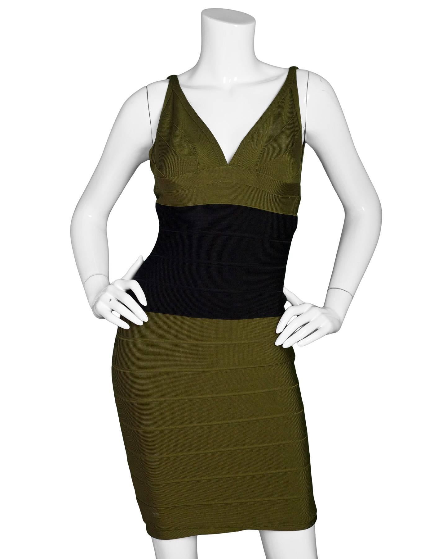 Herve Leger Olive Green & Black Bandage Dress Sz M

Made In: China
Color: Olive green, black
Composition: 90% Rayon, 9% Nylon, 1% Spandex
Lining: None
Closure/Opening: Zip closure at back
Overall Conditon: Excellent pre-owned condition with the