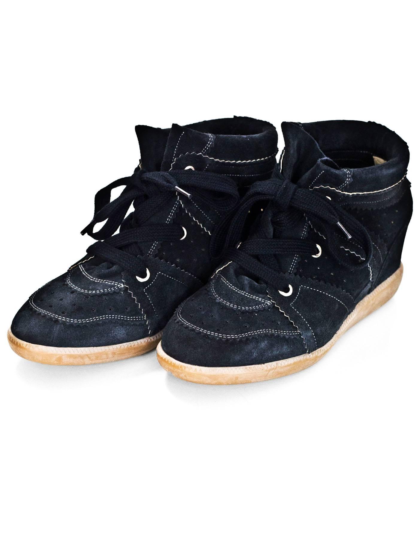 Isabel Marant Black Bobby Suede Wedge Sneakers Sz 41

Color: Black
Materials: Suede
Closure/Opening: Lace tie closure
Sole Stamp: Isabel Marant 41
Retail Price: $600 + tax
Overall Condition: Excellent pre-owned condition with the exception of some