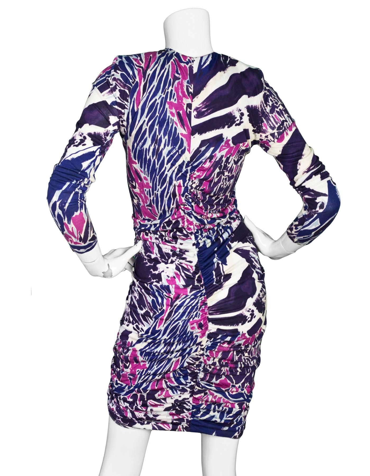 Emilio Pucci Purple & Pink Print Dress Sz 12
Features shoulder padding and front zup closure with ruching throughout

Made In: Italy
Color: Purple, pink, ivory
Composition: 100% Rayon
Lining: None
Closure/Opening: Front zip closure
Overall