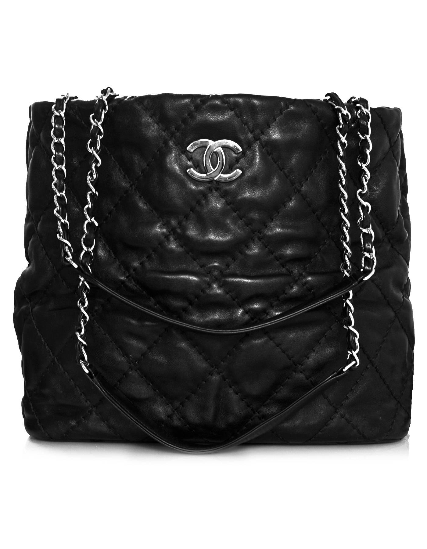 Chanel Black Quilted Ultimate Stitch Tote

Made In: France
Year of Production: 2012-2013
Color: Black
Hardware: Silvertone
Materials: Leather, metal
Lining: Black textile
Closure/opening: Open top
Exterior Pockets: None
Interior Pockets: One wall