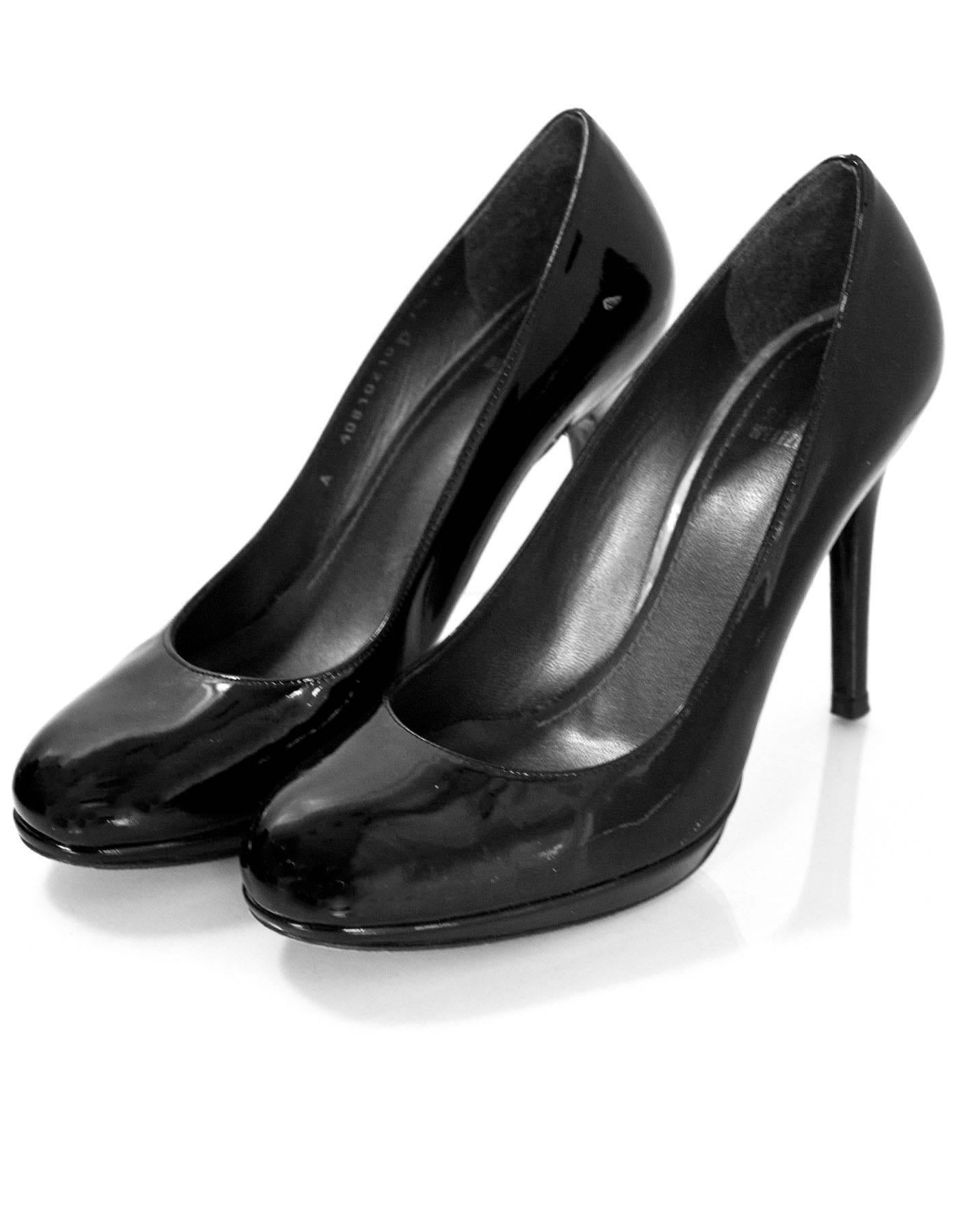 Stuart Weitzman Black Patent Pumps Sz 7.5D

Made In: Spain
Color: Black
Materials: Patent leather
Closure/Opening: Slide on
Sole Stamp: Stuart Weitzman Leather Sole Made In Spain
Overall Condition: Excellent pre-owned condition with the exception of
