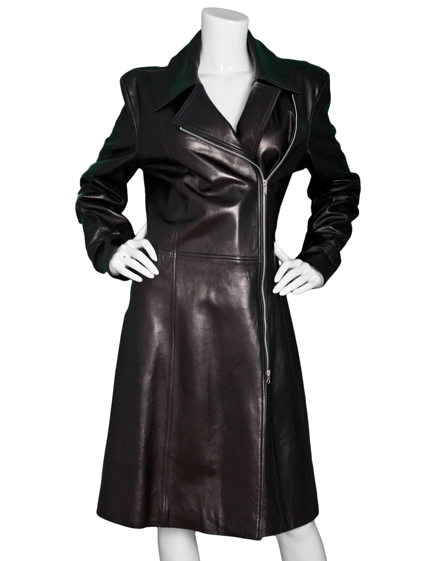 Rachelle Black Leather Zip Moto Coat Sz L

Made In: USA
Color: Black
Composition: 100% Leather
Lining: Black textile
Closure/Opening: Front zip closure
Exterior Pockets: None
Interior Pockets: None
Overall Condition: Excellent pre-owned condition