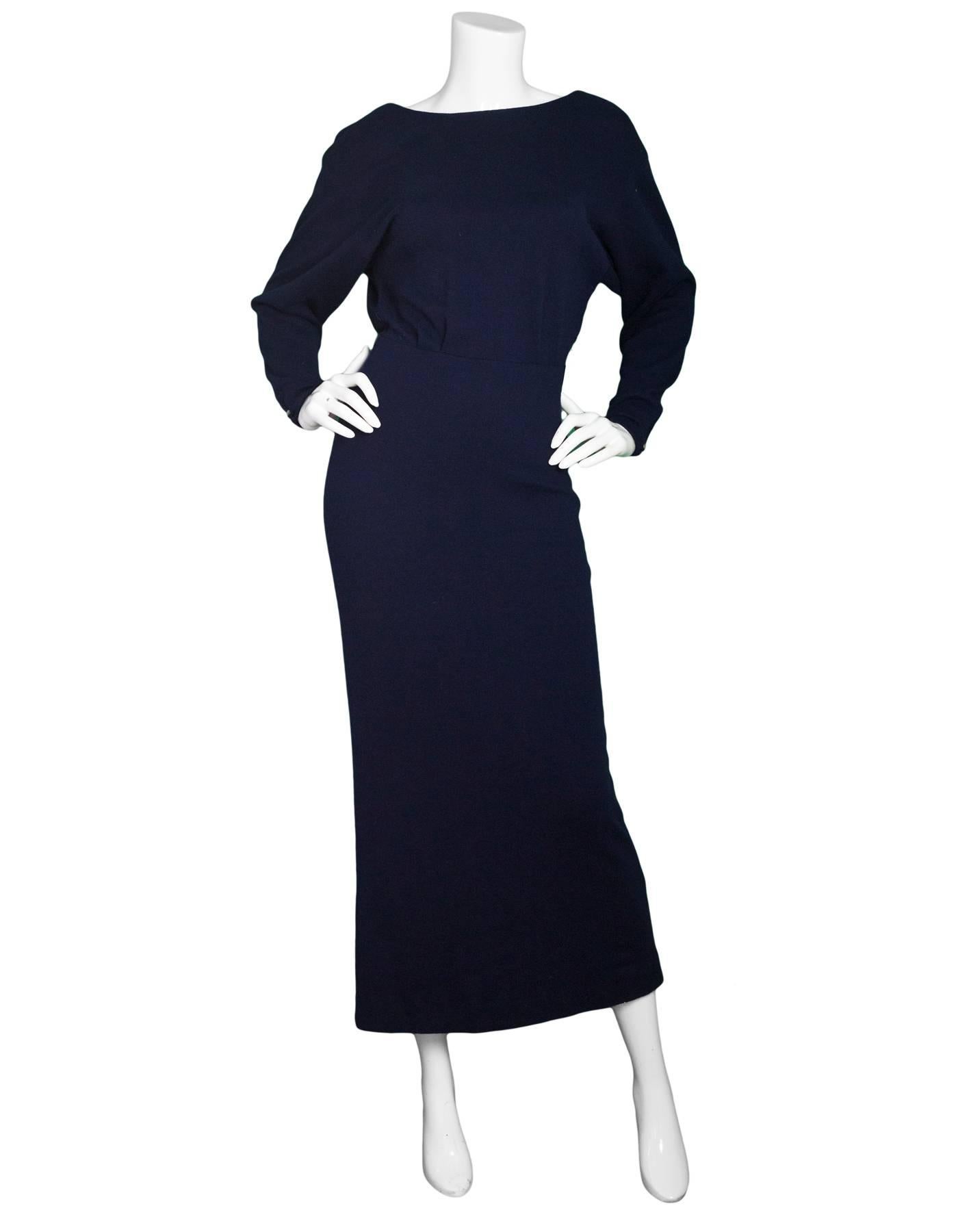 Ralph Lauren Navy Cashmere Dolman Sleeve Dress Sz 4

Features open back

Made In: USA
Color: Navy
Composition: 100% cashmere
Lining: None
Closure/Opening: Zip closure at back of skirt
Exterior Pockets: None
Interior Pockets: None
Overall Condition:
