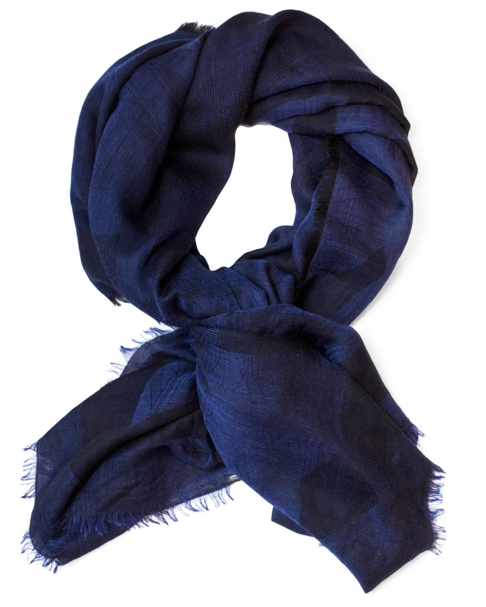 Chanel Navy & Black Cashmere Blend CC Scarf

Made In: Italy
Color: Navy, black
Composition: 81% cashmere, 19% silk
Overall Condition: Excellent pre-owned condition

Measurements:
Length: 56