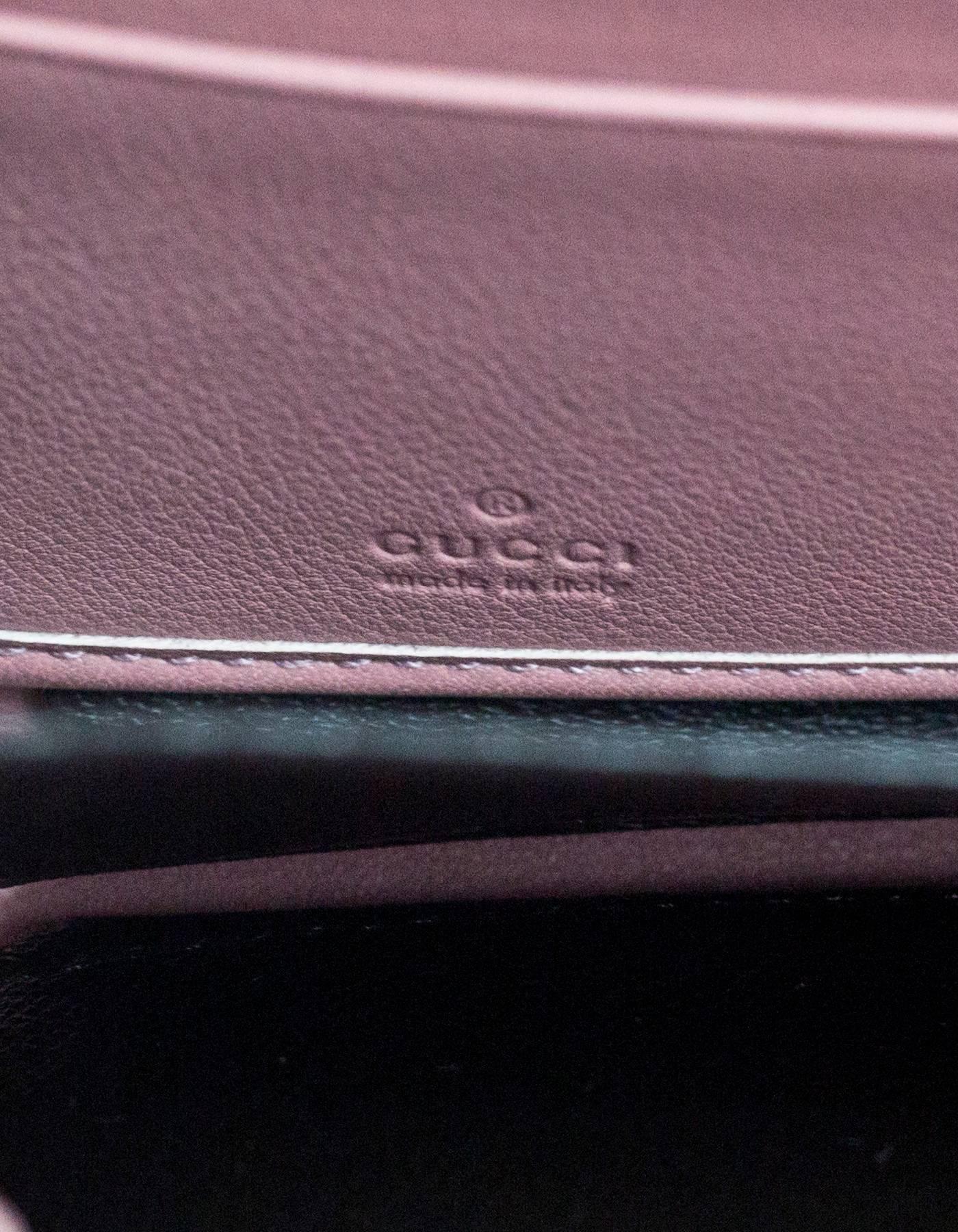 Women's Gucci Pink Embossed Monogram Leather Zip Around Wristlet Wallet