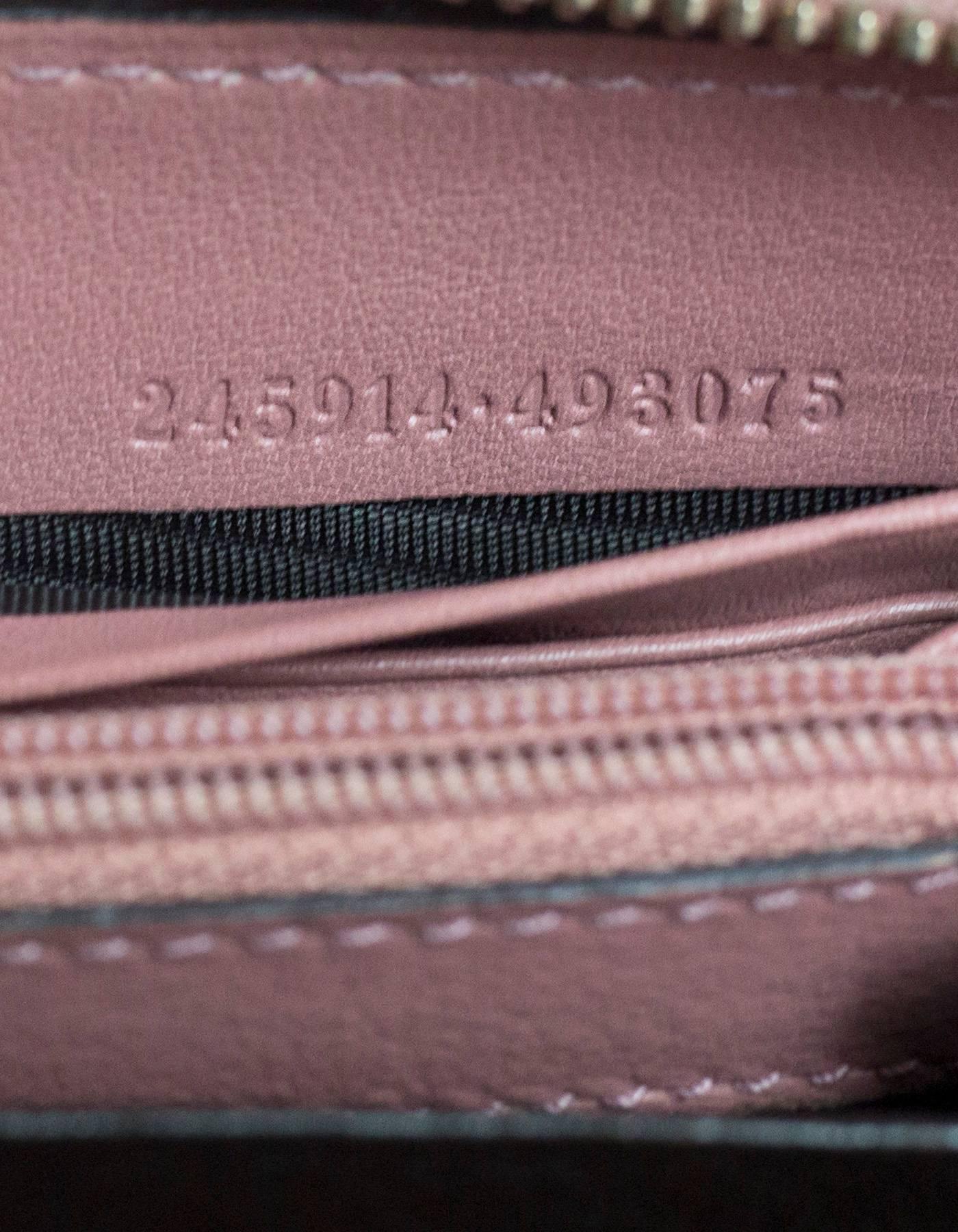 Gucci Pink Embossed Monogram Leather Zip Around Wristlet Wallet 1