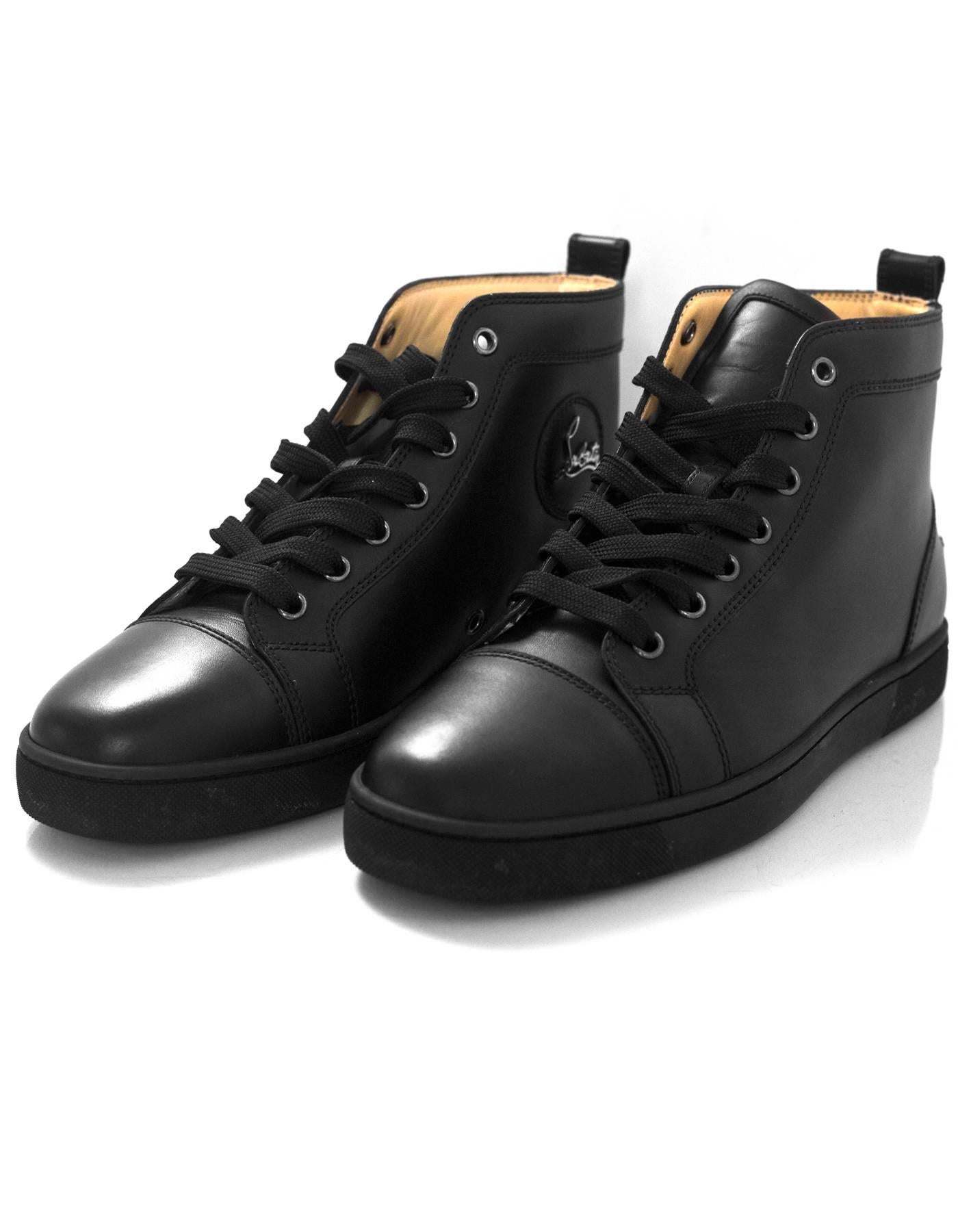 Christian Louboutin Black Leather Louis Sneakers Sz 40

Made In: EU
Color: Black
Materials: Leather, rubber
Closure/Opening: Lace tie closure
Sole Stamp: Christian Louboutin Made in EU
Retail Price: $898 + tax
Overall Condition: Excellent pre-owned