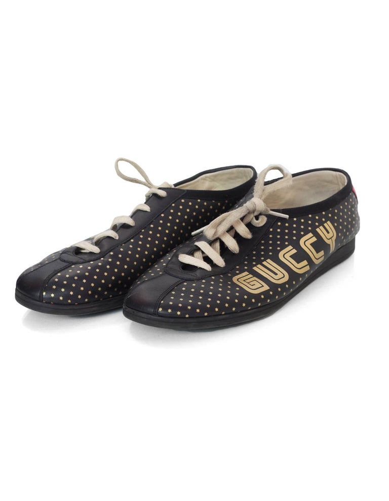 Gucci Men's Black and Gold Falacer Guccy Sega Logo ...