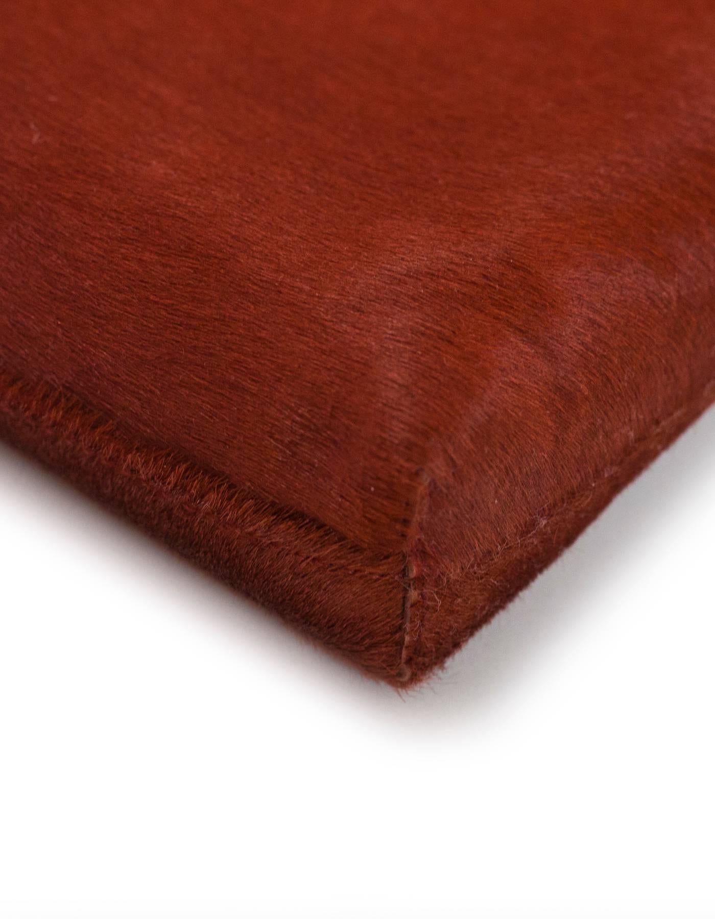 The Row Rust Calf-Hair Tassel Wristlet Clutch Bag  1