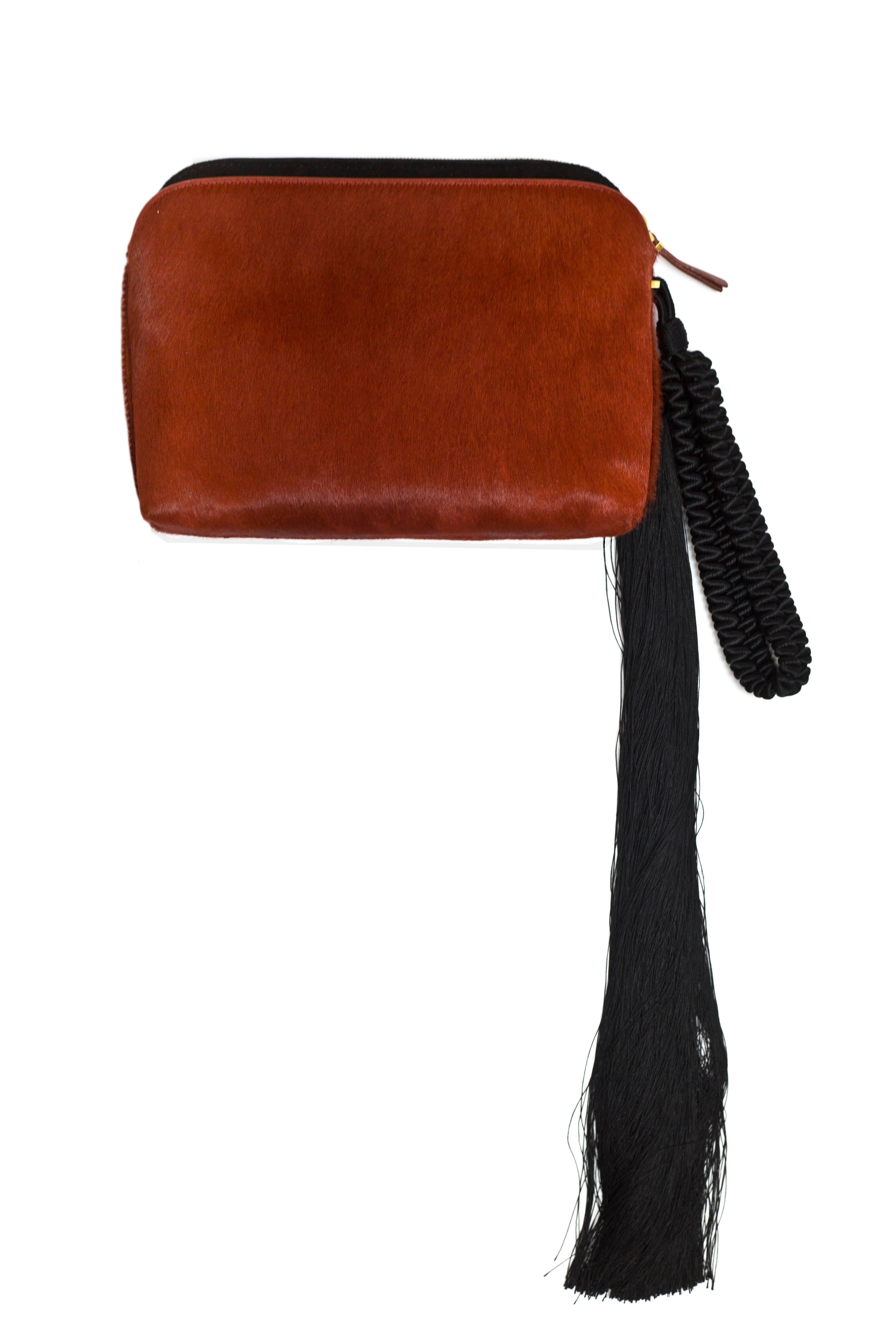 The Row Rust Calf-Hair Tassel Wristlet Clutch Bag  In Excellent Condition In New York, NY