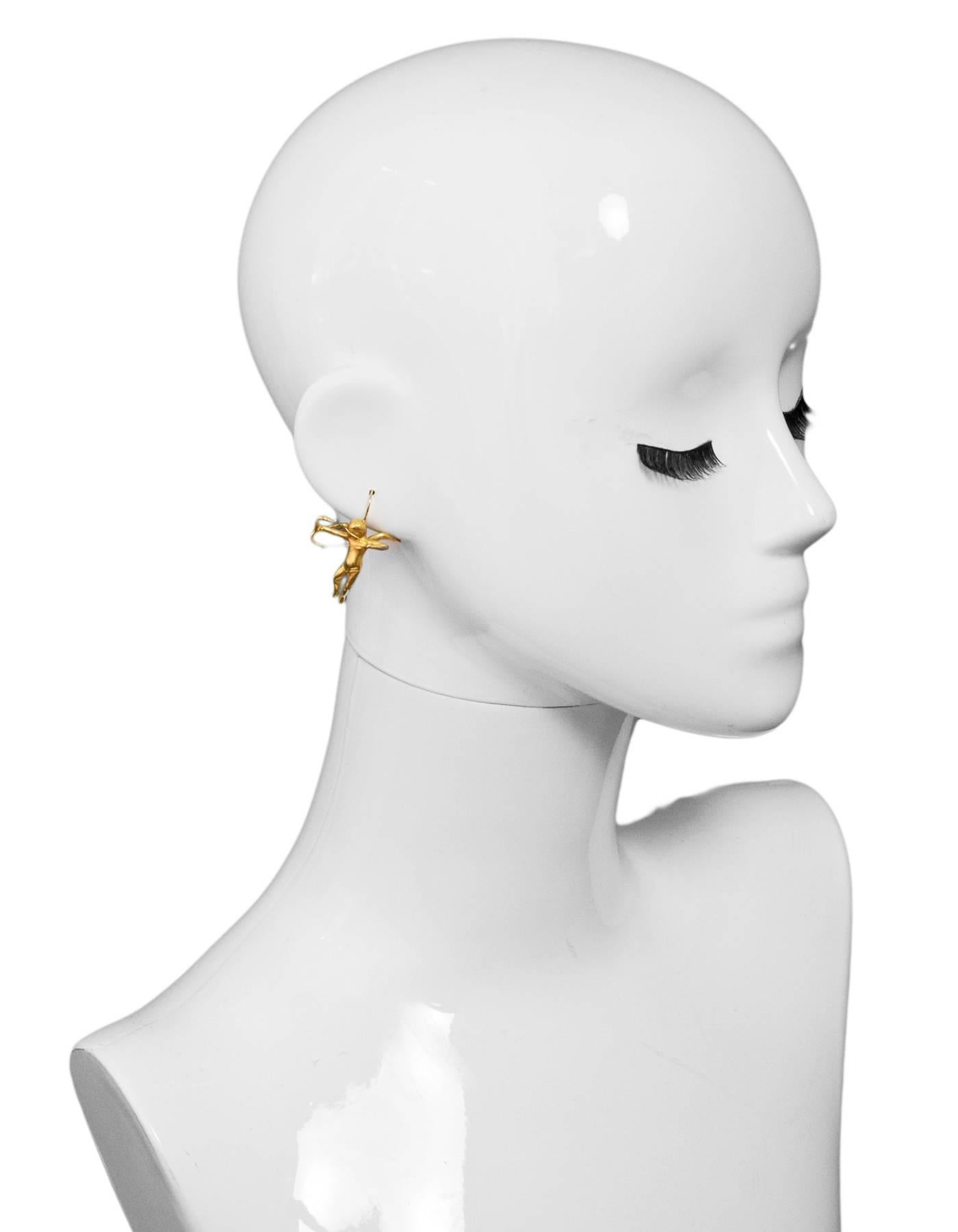 Gabriella Kiss 18k Yellow Gold Plated Vermeil Cupid Earrings

Color: Yellow
Materials: 18k yellow gold
Closure: Pierced/ french hooks
Retail Price: $400 + tax
Overall Condition: Excellent pre-owned condition with the exception of some surface