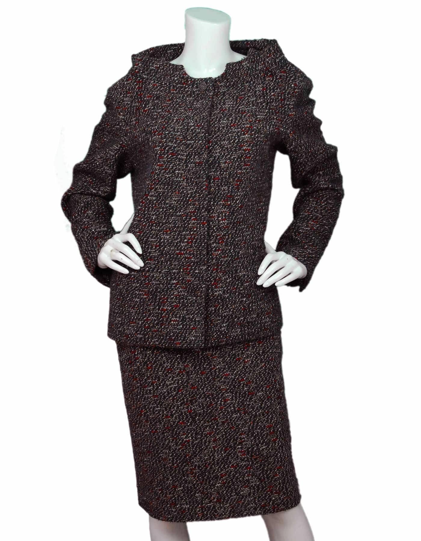 Chanel Fall '13 Runway Red & Navy Wool Skirt 

Made In: France
Color: Red, Navy, brown and white
Composition: 60% wool, 26% nylon, 7% mohair, 7% alpaca
Lining: Navy, 100% silk
Closure/Opening: Back center zipper
Exterior Pockets: Two hip