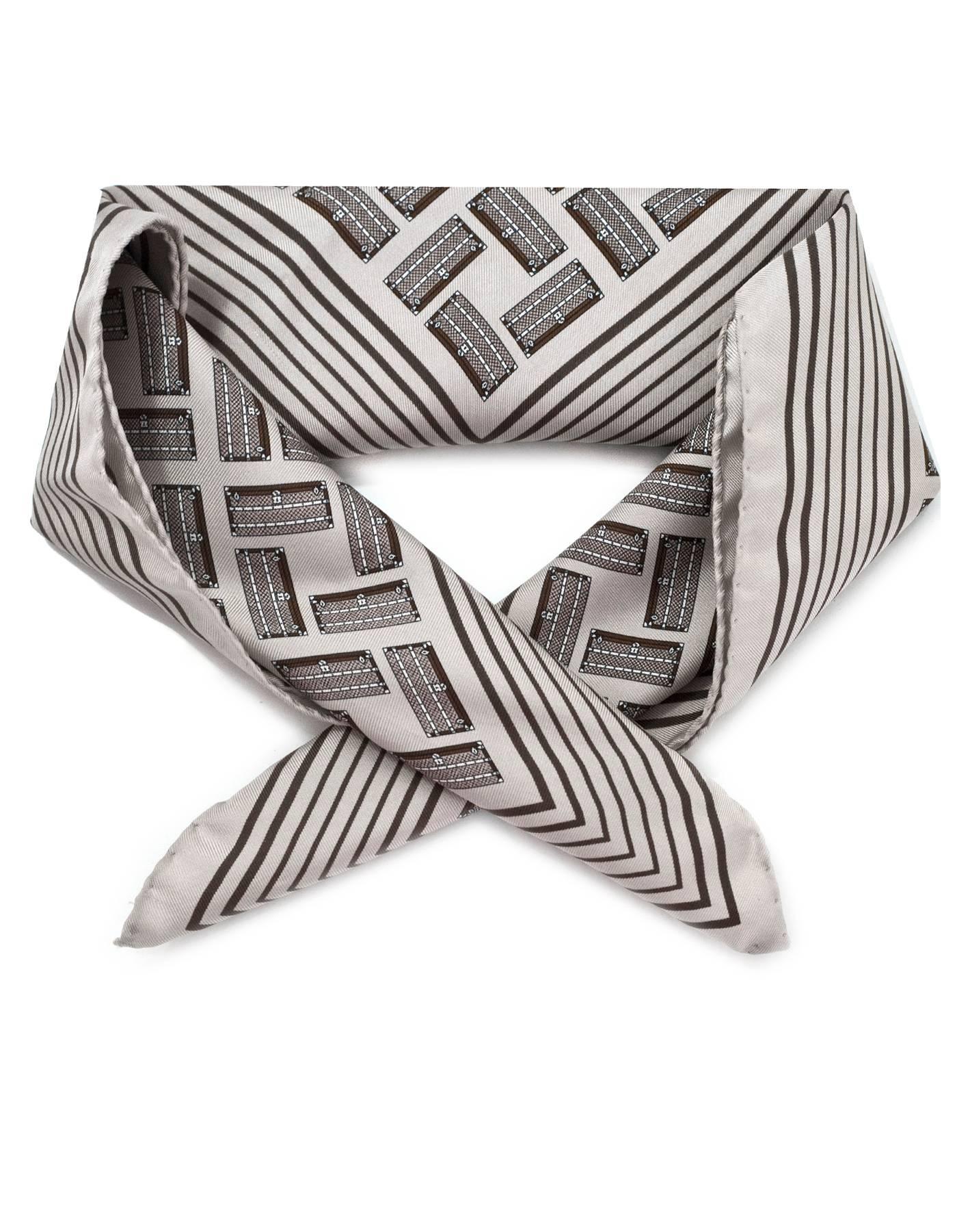Louis Vuitton Grey Silk Trunks Scarf

Made In: Italy
Color: Grey
Composition: 100% Silk
Overall Condition: Excellent pre-owned condition, very light marks

Measurements:
Length: 18