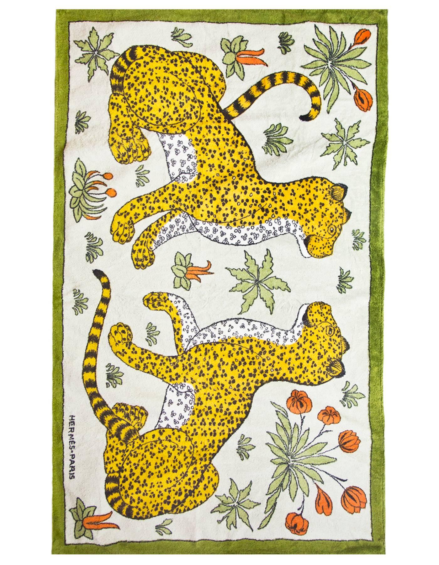 Hermes Green Leopard Print Beach Towel

Made In: France
Color: Green, yellow
Composition: 100% cotton
Retail Price: $600 + tax
Overall Condition: Excellent pre-owned condition, general fading

Measurements: 
Towel: 58