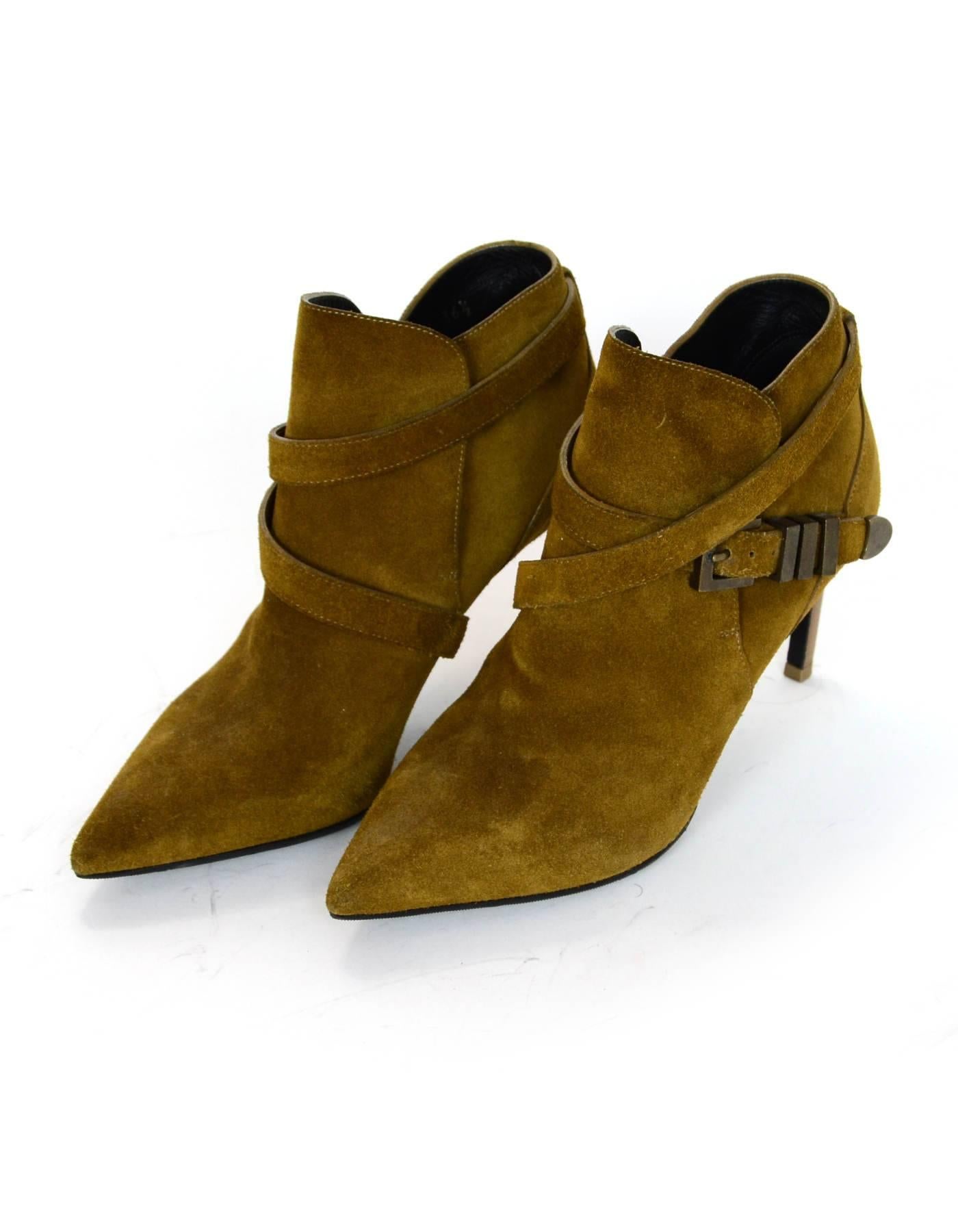 Saint Laurent Tan Suede Booties Sz 36.5

Made In: Italy
Color: Tan
Materials: Suede
Closure/Opening: Slide on with side buckle closure
Sole Stamp: Saint Laurent Made in Italy 36.5
Overall Condition: Excellent pre-owned condition with the exception