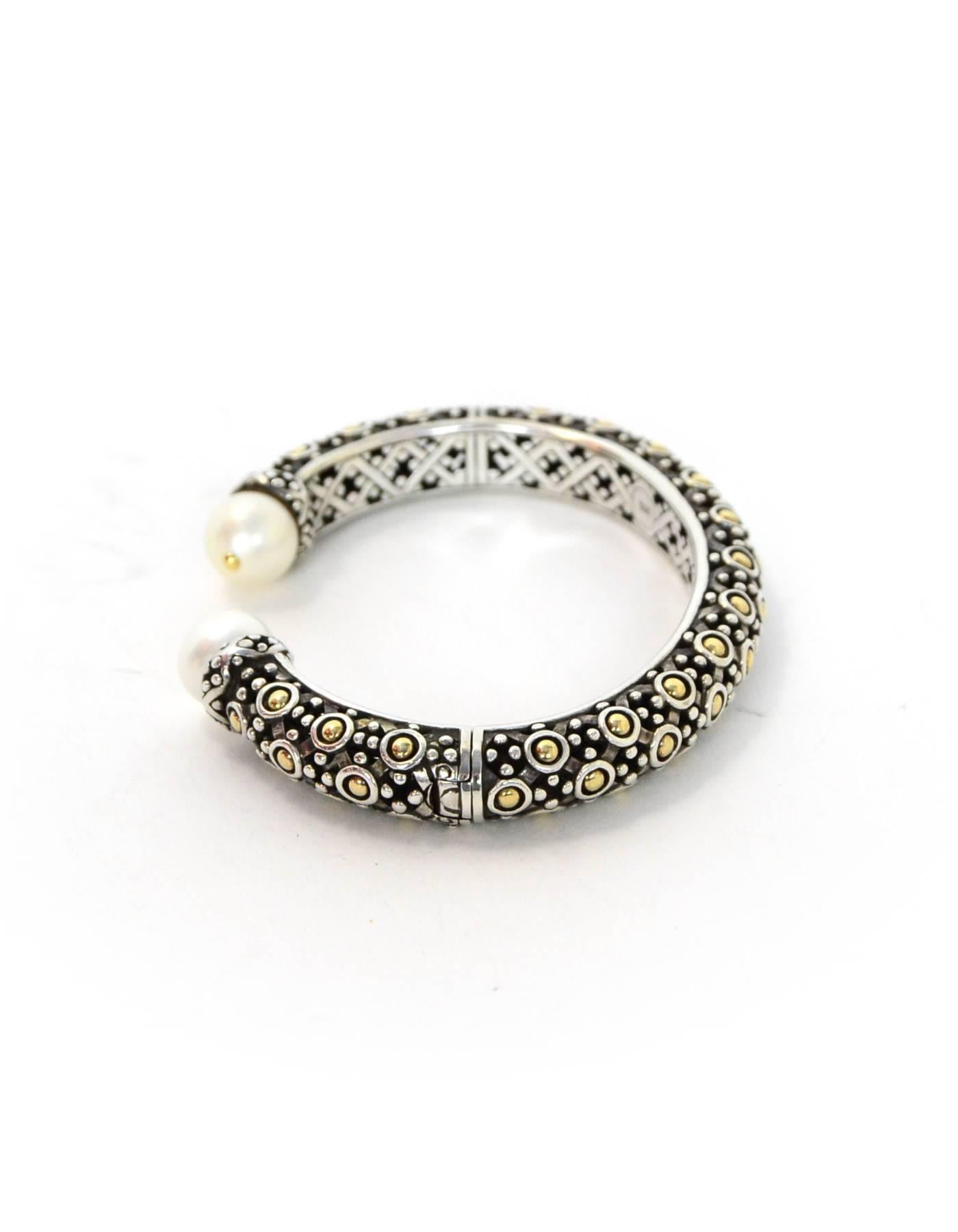 John Hardy Sterling, 18k Gold & Pearl Jaisalmer Dot Hinge Bracelet

Color: Silver, gold, ivory
Materials: Sterling, gold, pearl
Closure: Hinge closure
Retail Price: $995 + tax
Overall Condition: Excellent pre-owned condition, light surface